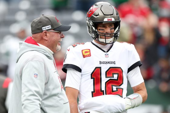 Tom Brady of the Tampa Bay Buccaneers and head coach Bruce Arians talk during warm ups.