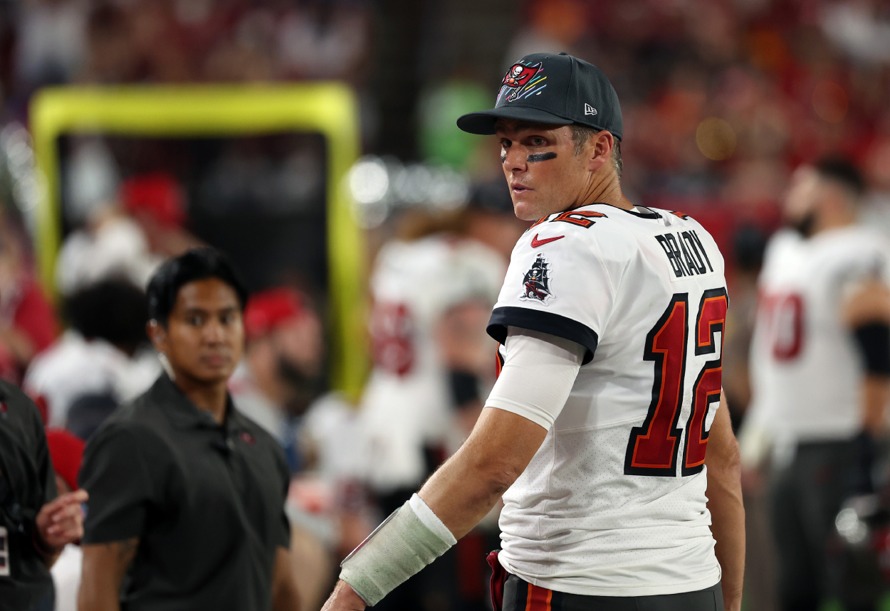 Tom Brady of the Tampa Bay Buccaneers looks on from the sidelines.