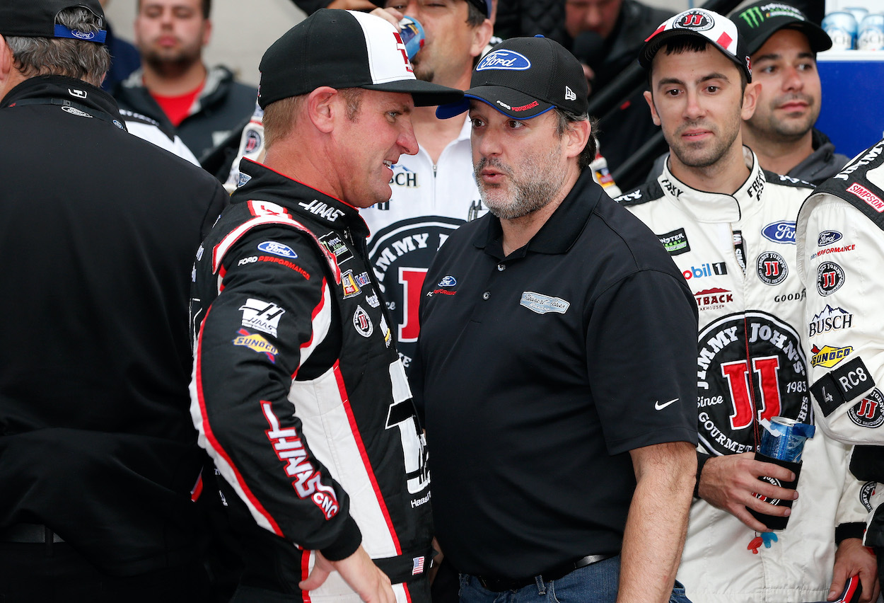 Clint Bowyer talks with Tony Stewart