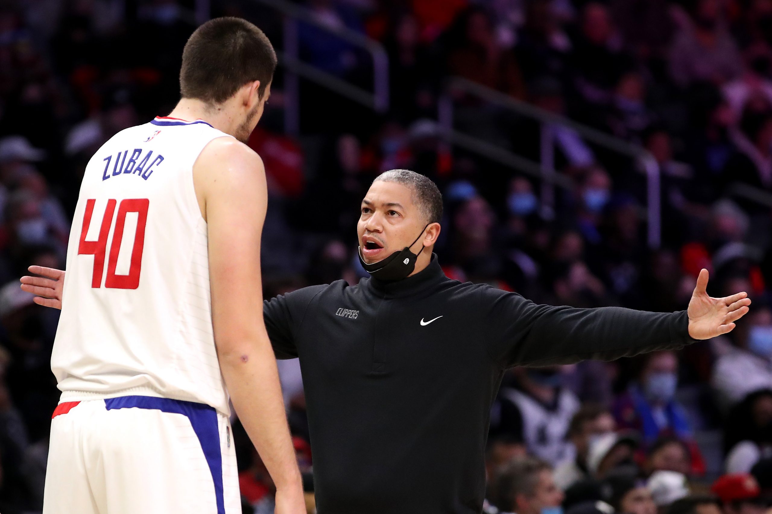 Los Angeles Clippers coach Tyronn Lue discusses strategy with center Ivica Zubac during a recent game against the Denver Nuggets.