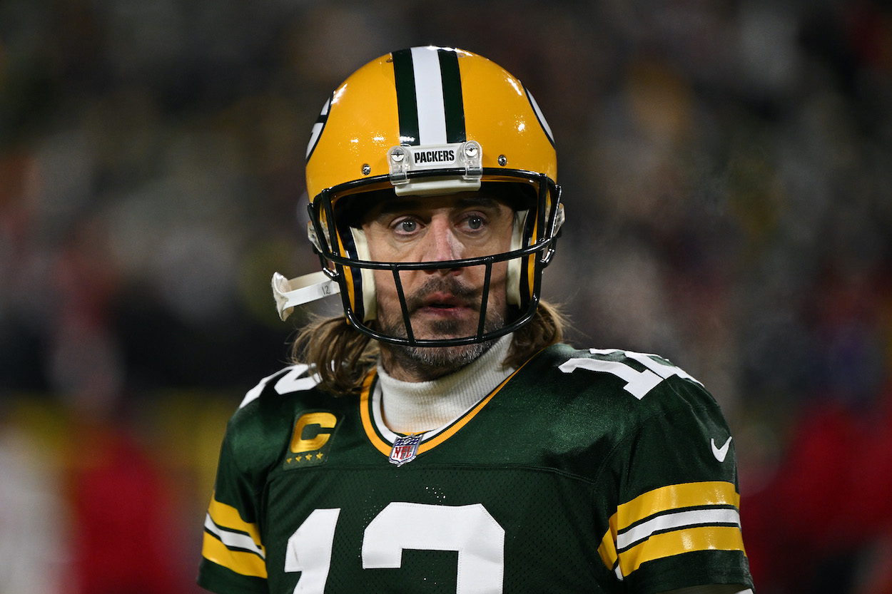 Aaron Rodgers of the Green Bay Packers reacts during the game against the San Francisco 49ers in NFC Divisional Playoff game at Lambeau Field on January 22, 2022. In the 2022 offseason, the Packers have to decide whether to keep or trade their QB and how to best deal with the Aaron Rodgers contract.