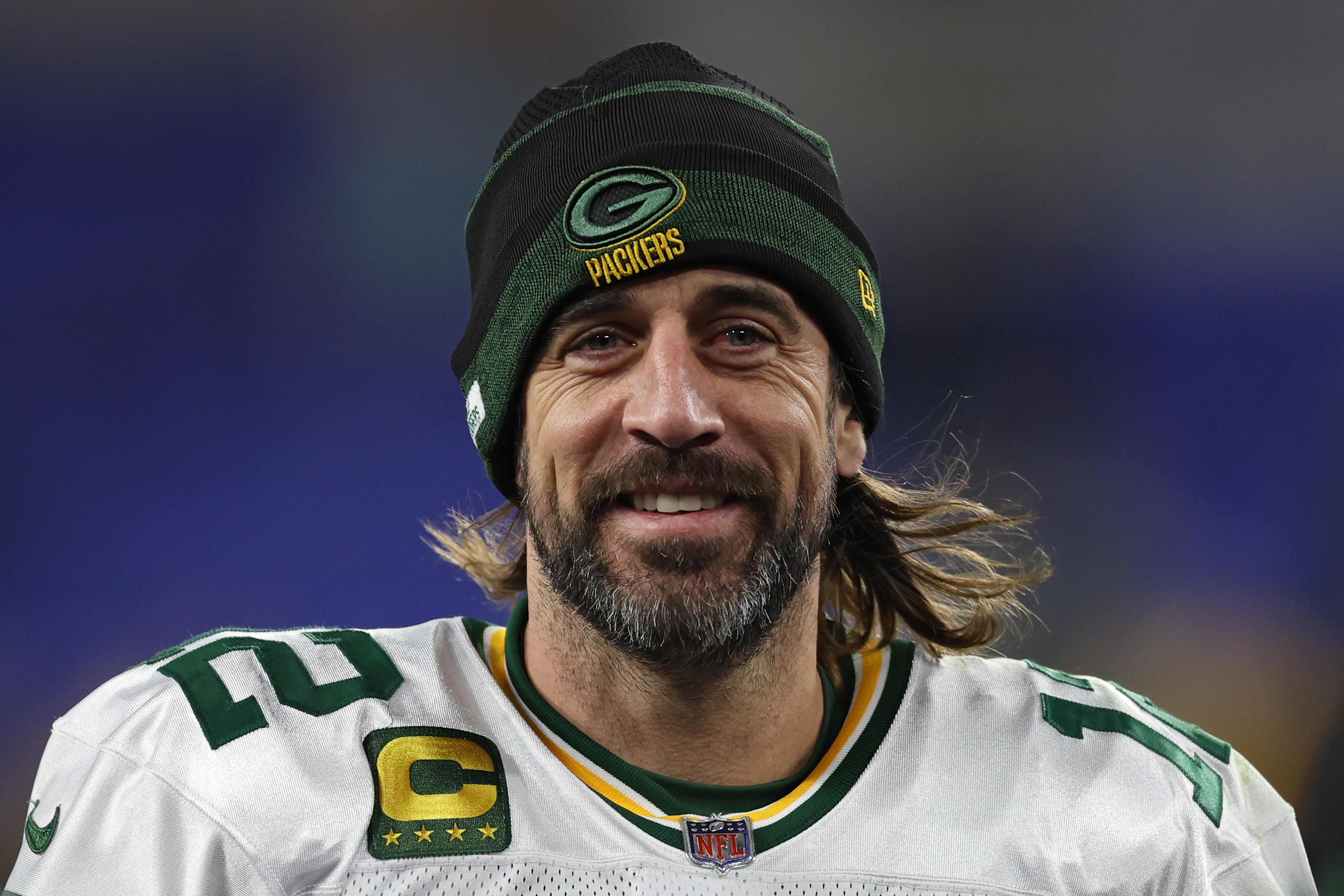 Packers QB Aaron Rodgers smiles after defeating the Ravens