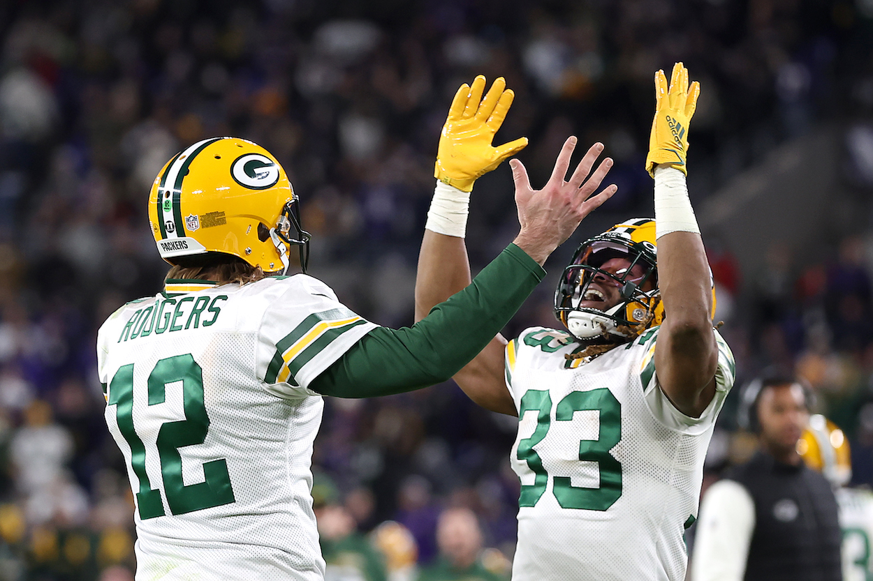 Packers' Aaron Rodgers and Aaron Jones.