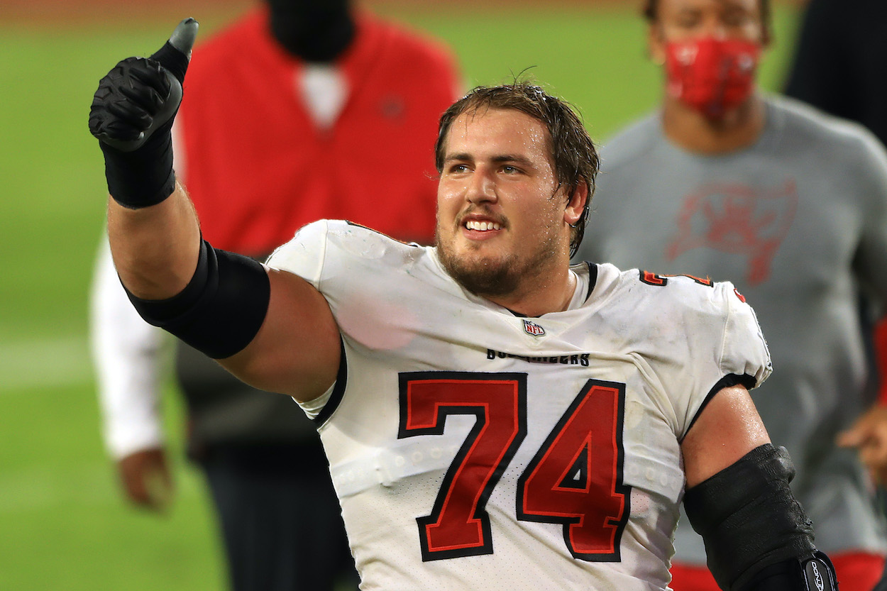 Ali Marpet of the Tampa Bay Buccaneers celebrates as he leaves the field after a 38-10 win against the Green Bay Packers at Raymond James Stadium on October 18, 2020 in Tampa, Florida.