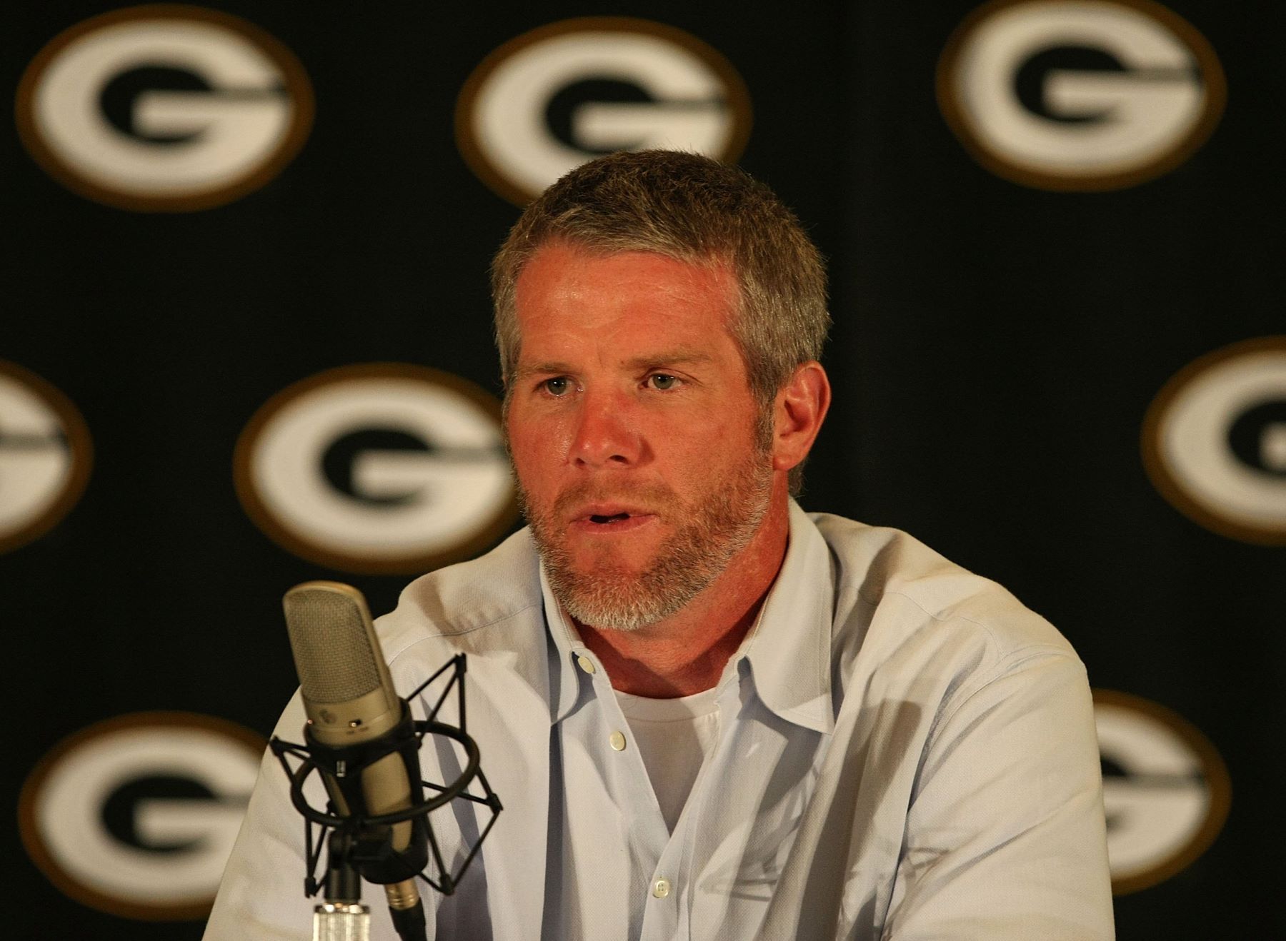 Brett Favre announcing his retirement from the Green Bay Packers at a press conference in Green Bay, Wisconsin