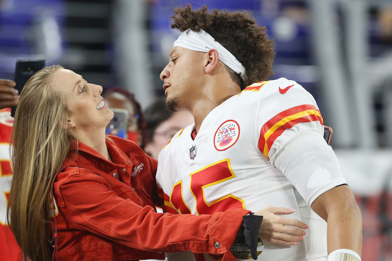 Patrick Mahomes of the Kansas City Chiefs greets his fiancee Brittany Matthews prior to the game against the Baltimore Ravens at M&T Bank Stadium on September 19, 2021. The QB recently had to respond to a false report he asked his fiancee and his brother, Jackson Mahomes, to stay home from games next season.