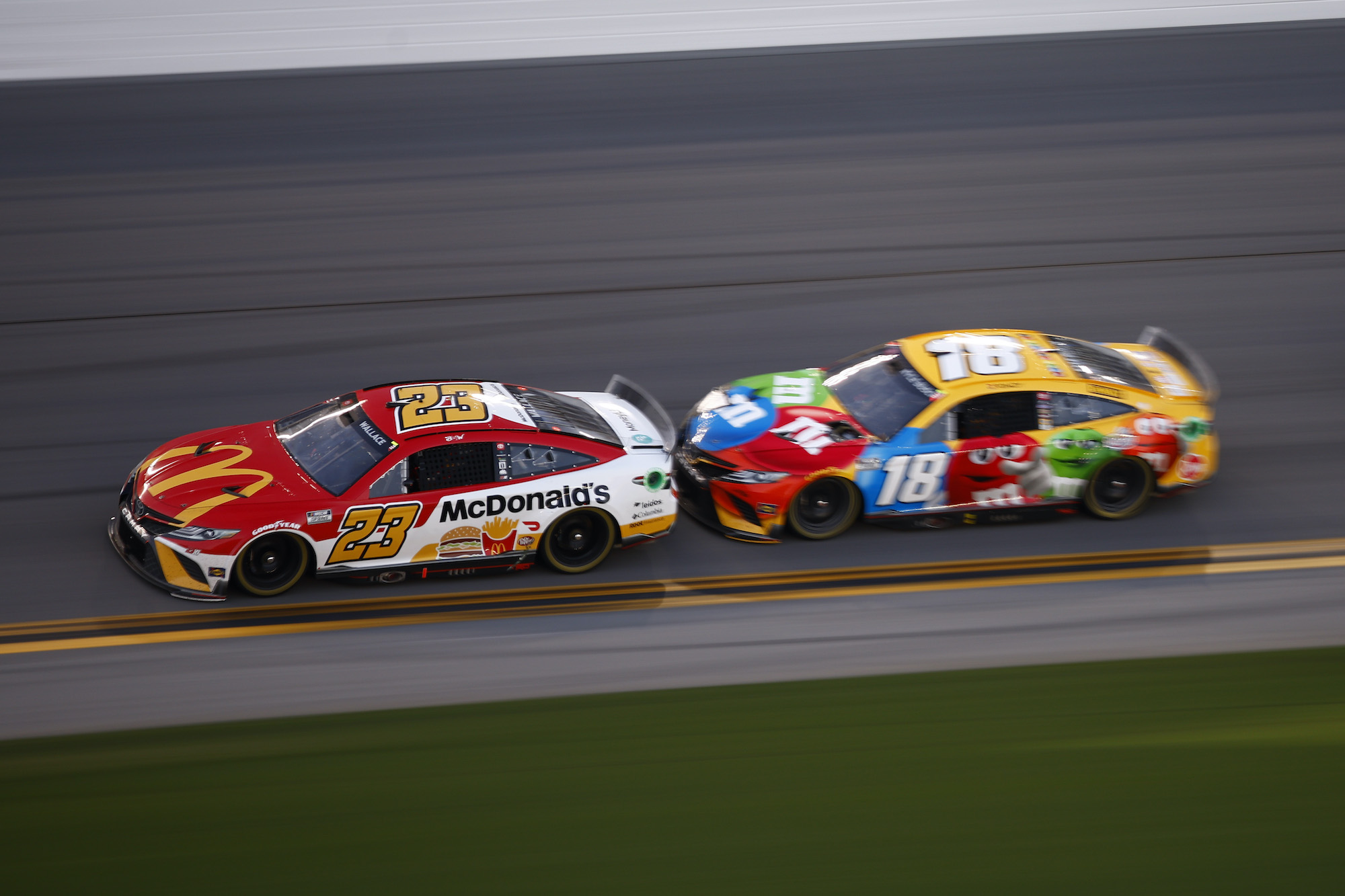 Bubba Wallace and Kyle Busch race at Daytona