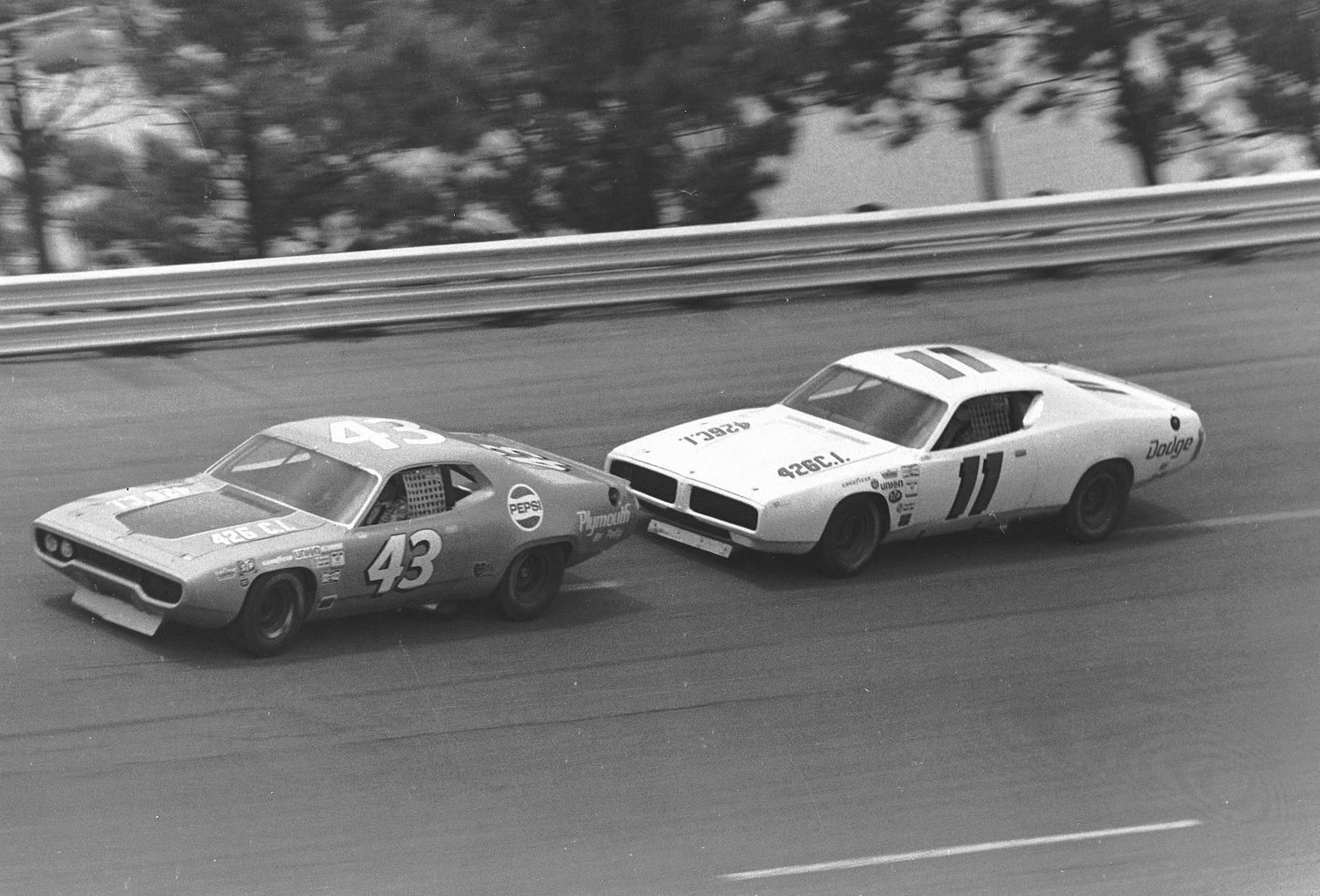 Richard Petty leads teammate Buddy Baker during the Dixie 500 NASCAR Cup race at Atlanta International Raceway in 1971, the final year of extended schedules and multiple short tracks. | ISC Images & Archives via Getty Images