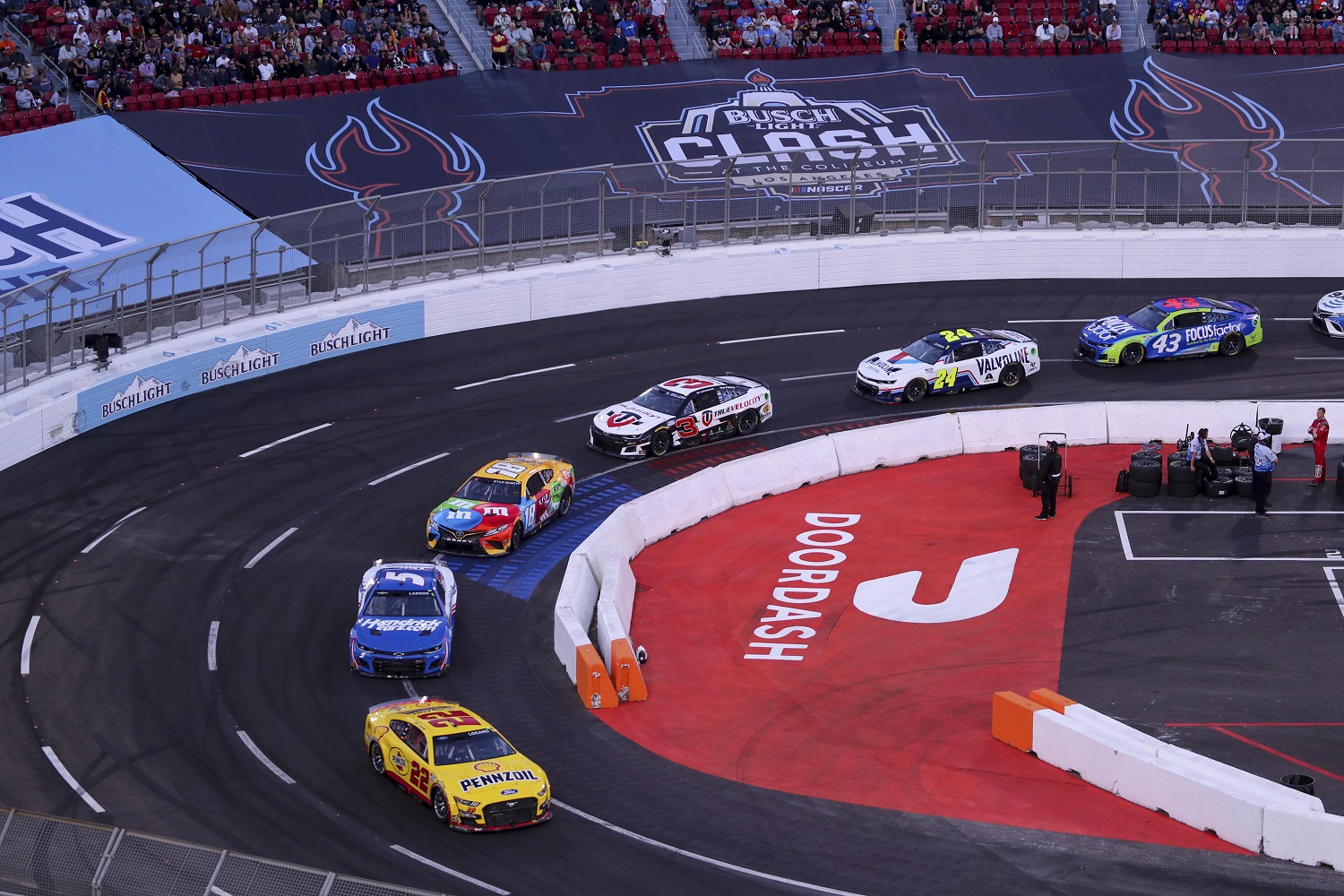 Joey Logano leads the pack on the quarter-mile track during the Busch Light Clash in Los Angeles on Feb. 6, 2022.