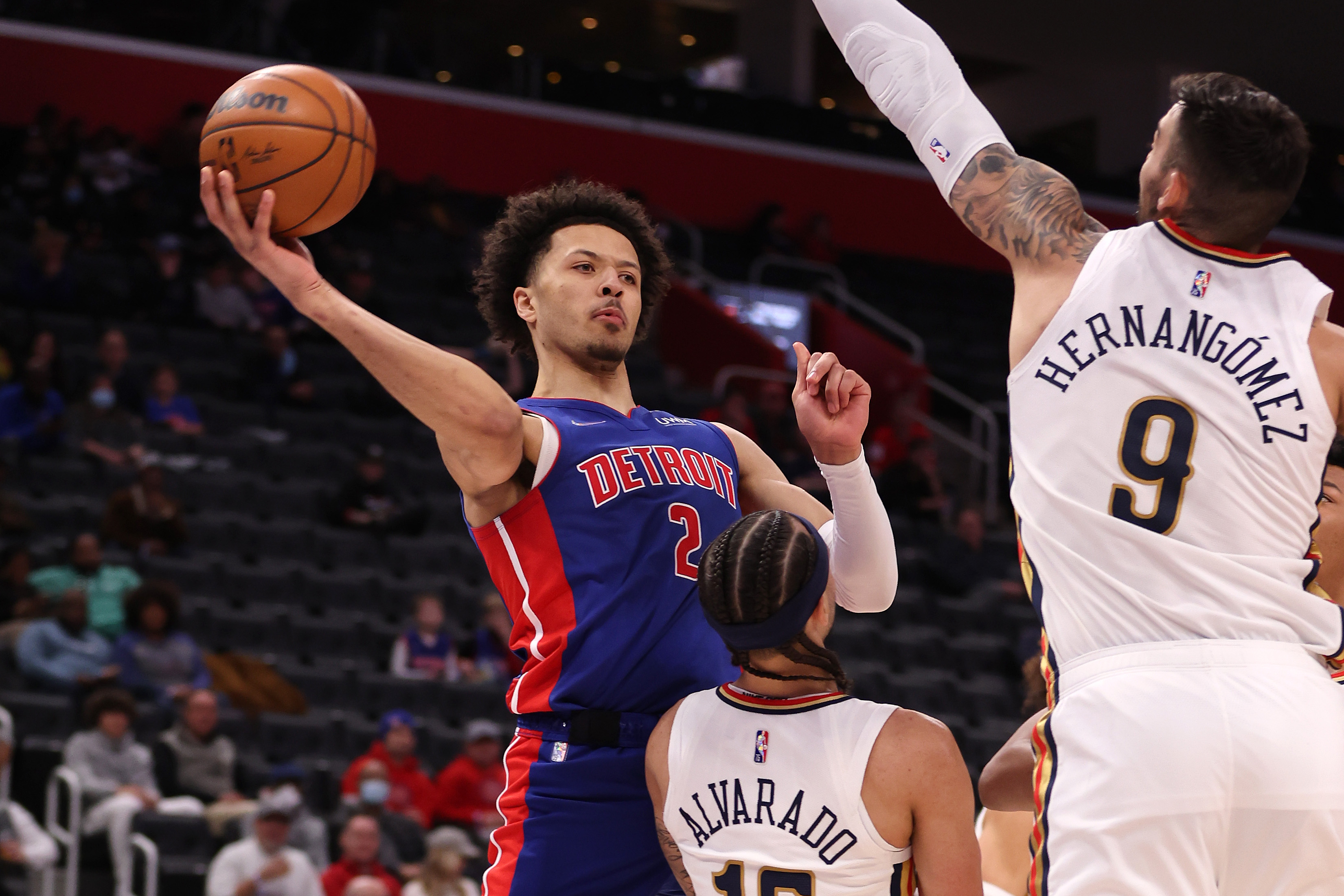 Detroit Pistons rookie Cade Cunningham looks to pass during an NBA game against the New Orleans Pelicans in February 2022
