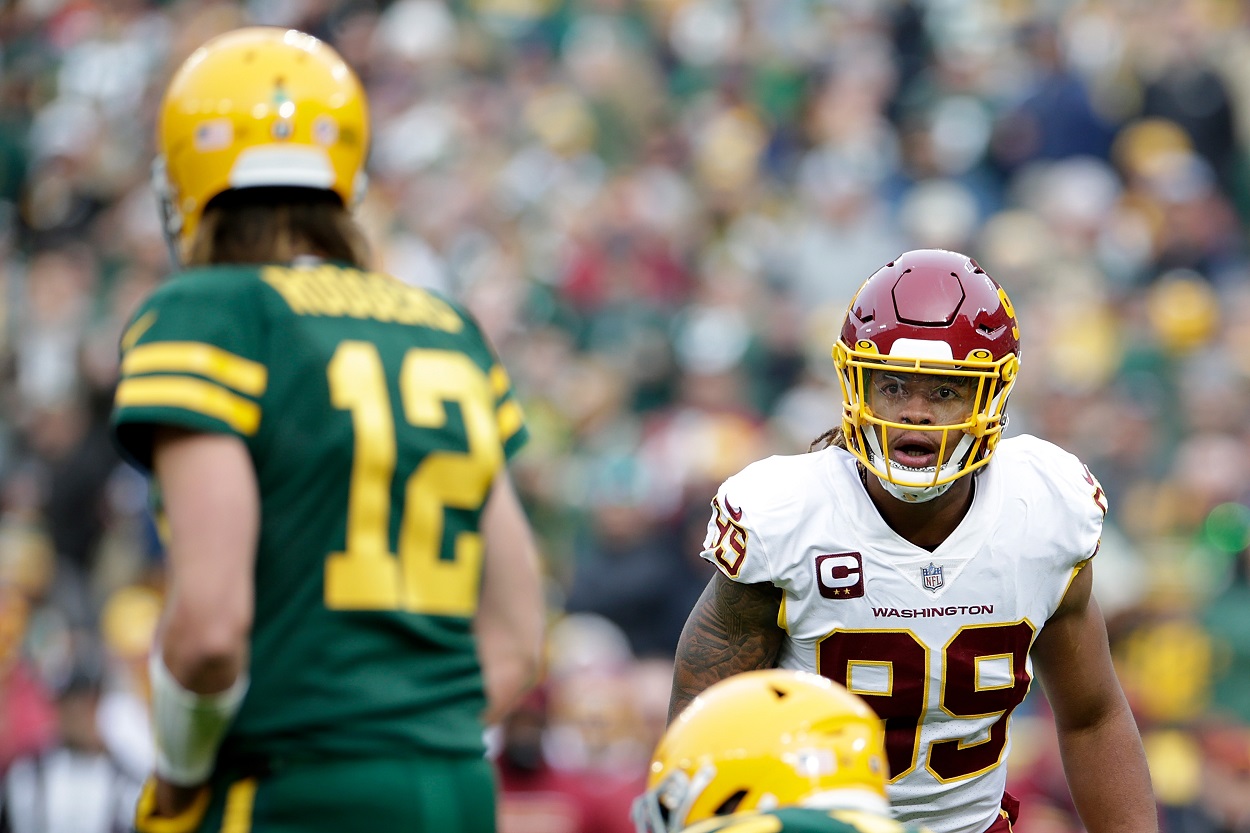 Chase Young and Aaron Rodgers . Washington Commanders