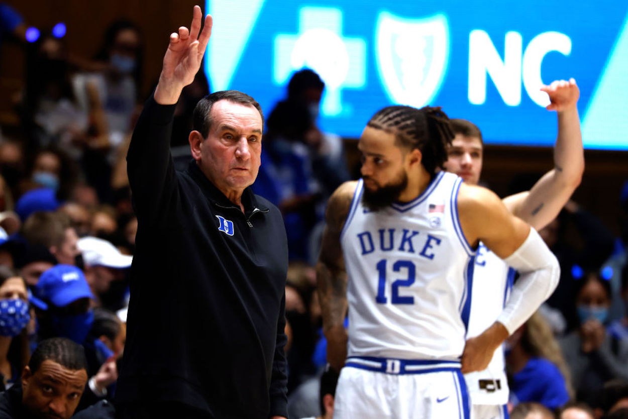 Mike Krzyzewski stands on the sidelines during one of his final Duke basketball home games.