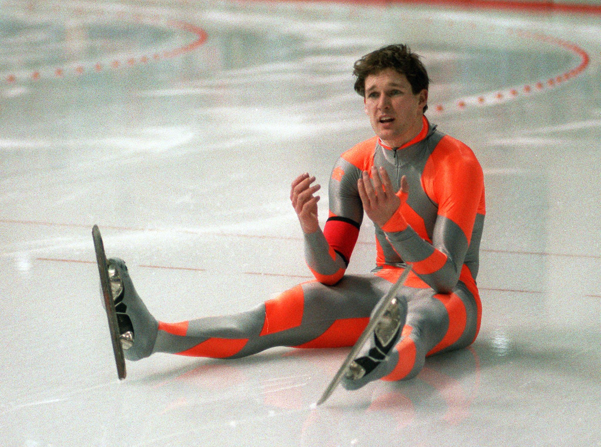 Speed skater Dan Jansen from the United States reacts as he sits on his ice after falling during the men's 1000m event at the Winter Olympic Games 18 February, 1988, in Calgary.