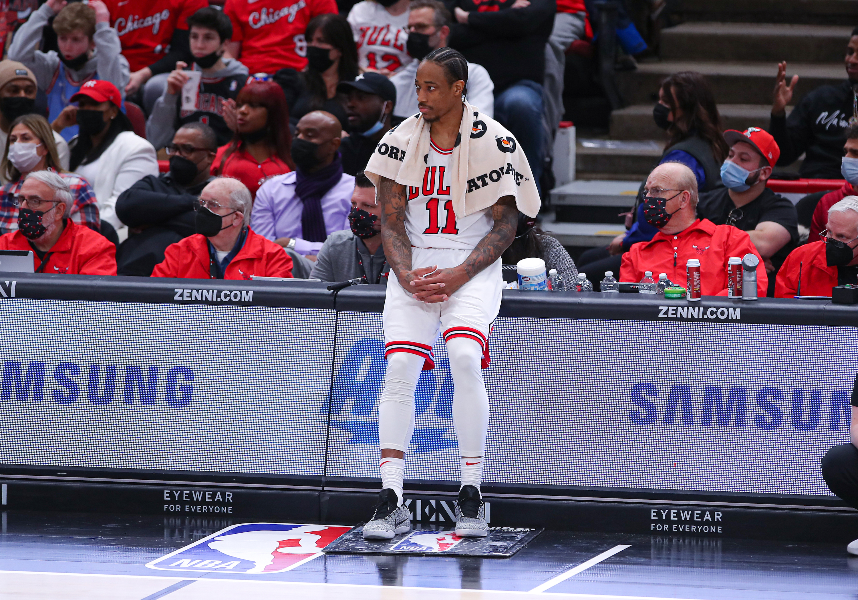Chicago Bulls star DeMar DeRozan waits to check into an NBA game against the San Antonio Spurs in February 2022