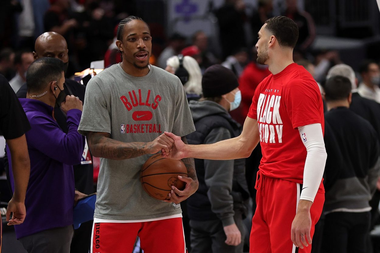 Chicago Bulls stars DeMar DeRozan (L) and Zach LaVine shake hands before an NBA game against the Phoenix Suns