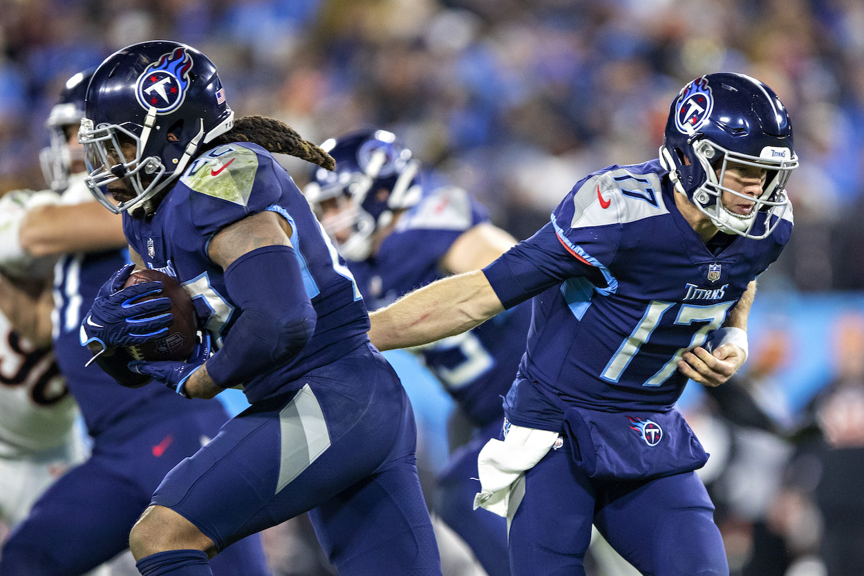 Titans players Derrick Henry and Ryan Tannehill.