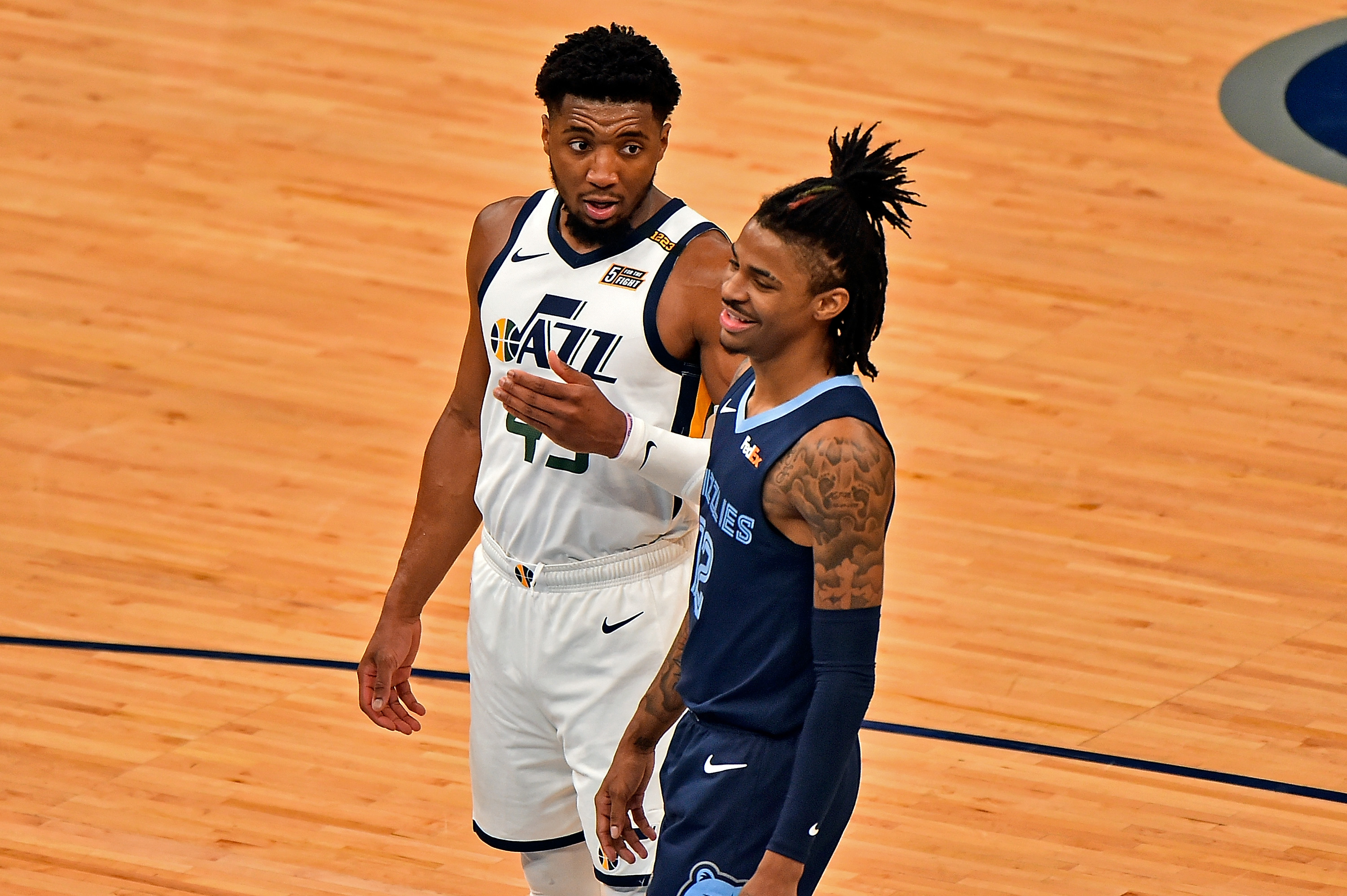 Utah Jazz star Donovan Mitchell looks at Memphis Grizzles star Ja Morant during the 2021 NBA Playoffs