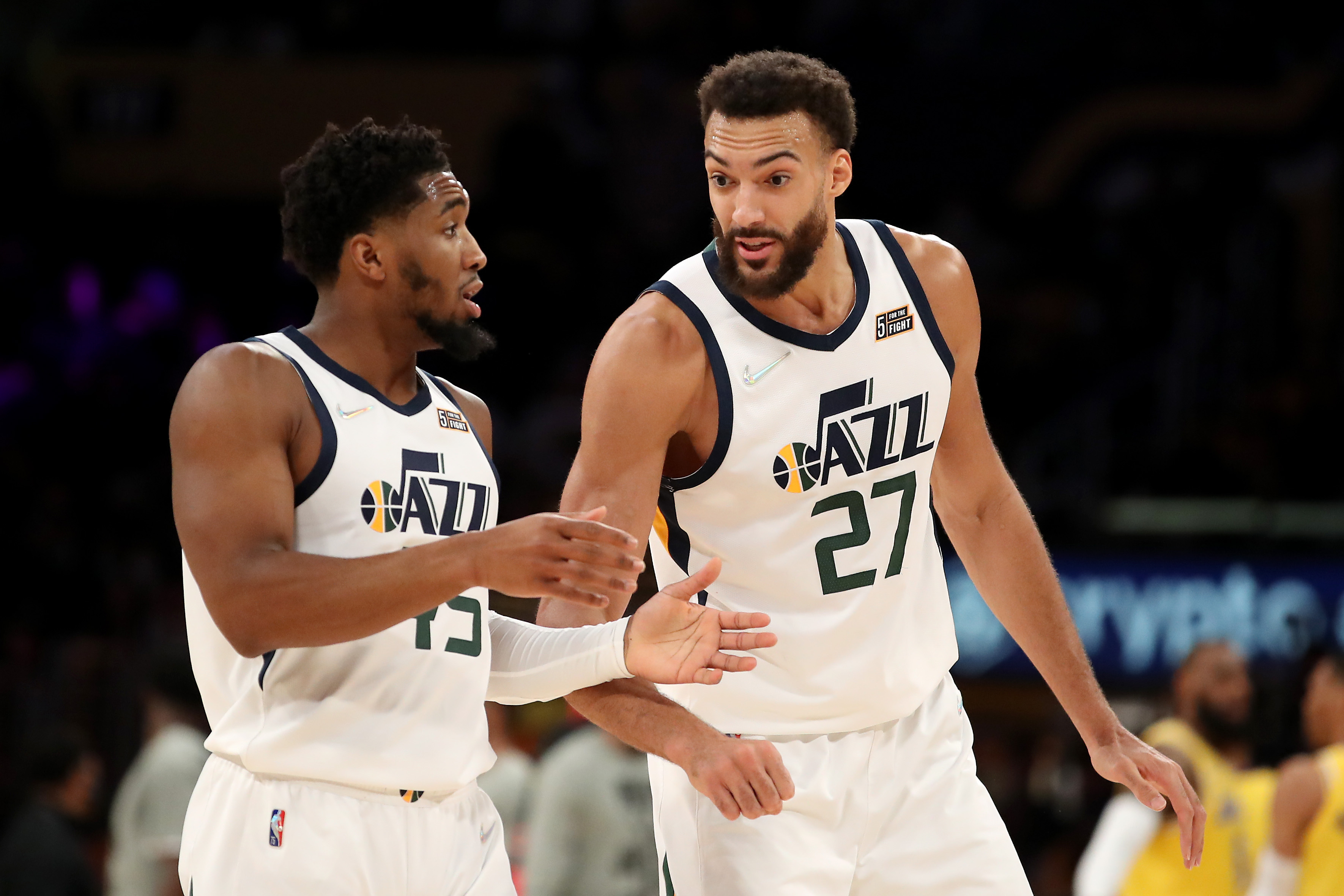 Utah Jazz stars Donovan Mitchell and Rudy Gobert talk during an NBA game against the Los Angeles Lakers in January 2022