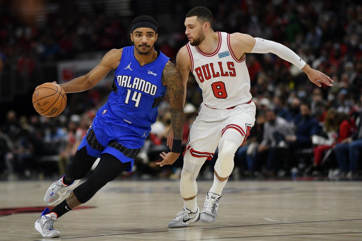 Orlando Magic guard Gary Harris dribbles past Chicago Bulls guard Zach LaVine during an NBA game in January 2022