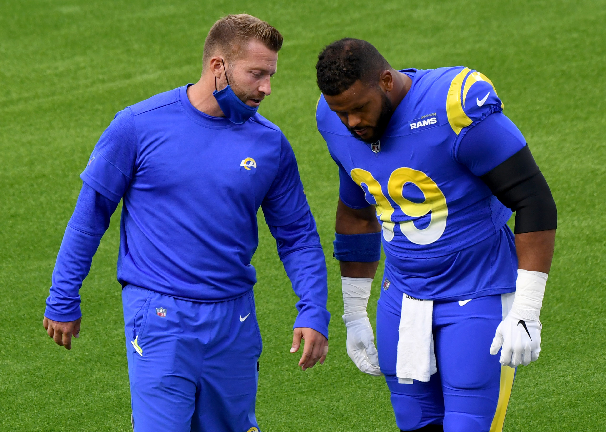 Rams HC Sean McVay talking to Aaron Donald.