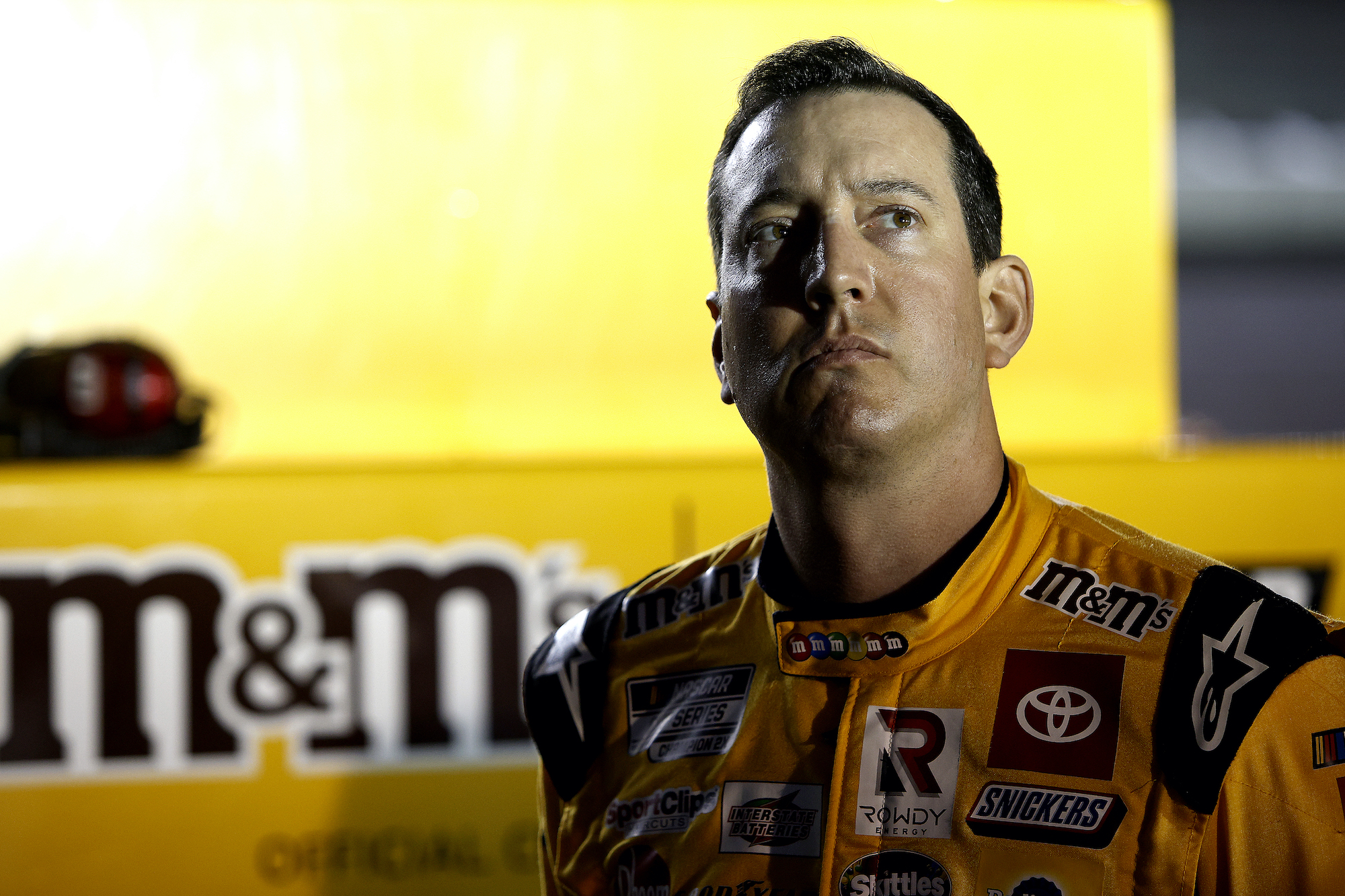 Kyle Busch looks on from grid
