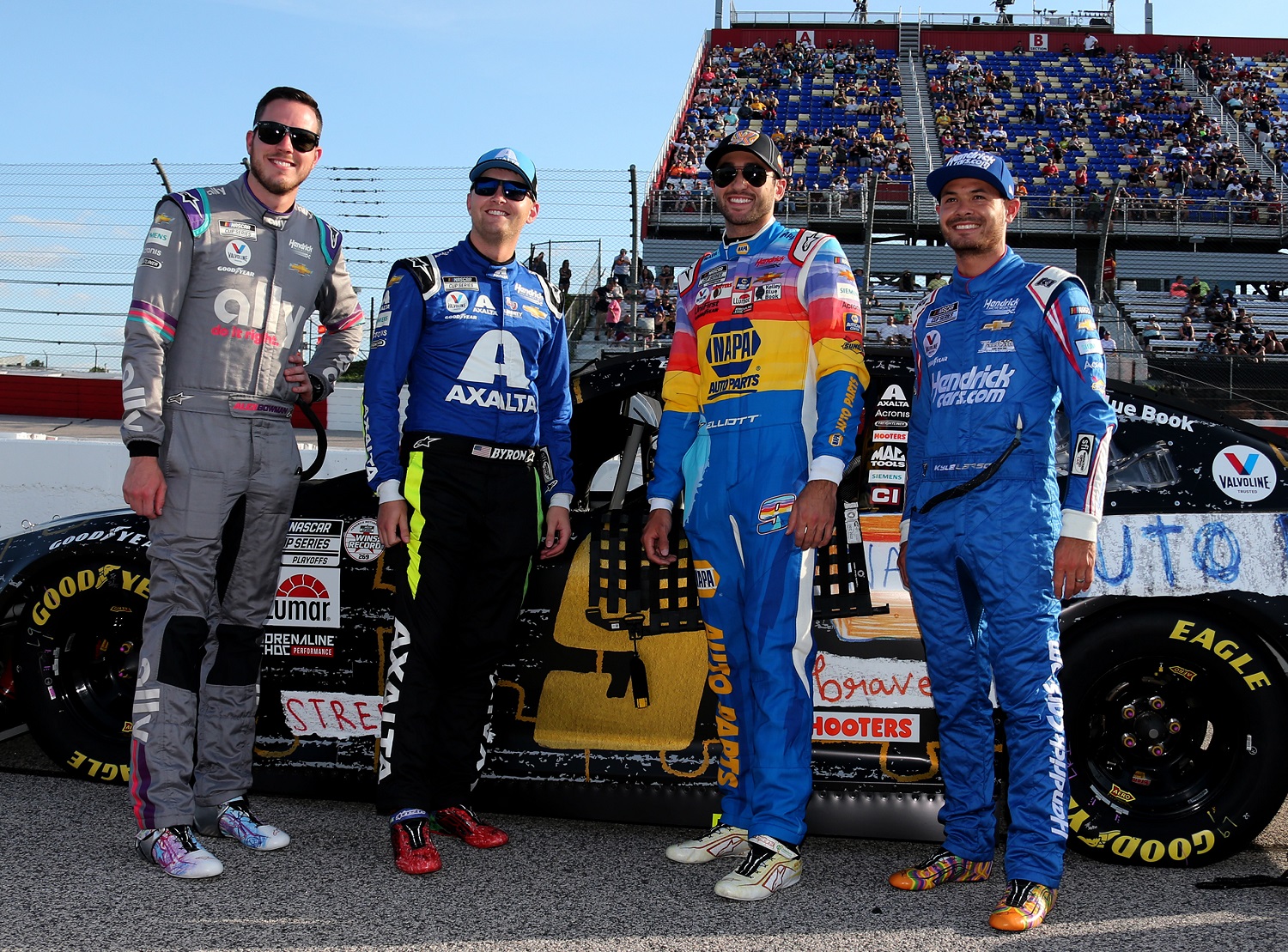Alex Bowman, William Byron, Chase Elliott, and Kyle Larson,of Hendrick Motorsports get together during the running of the NASCAR Cup Series Cook Out Southern 500 on Sept. 5, 2021.