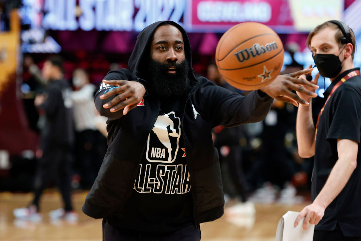 Philadelphia 76ers guard James Harden passes the ball ahead of the 2022 NBA All-Star Game.