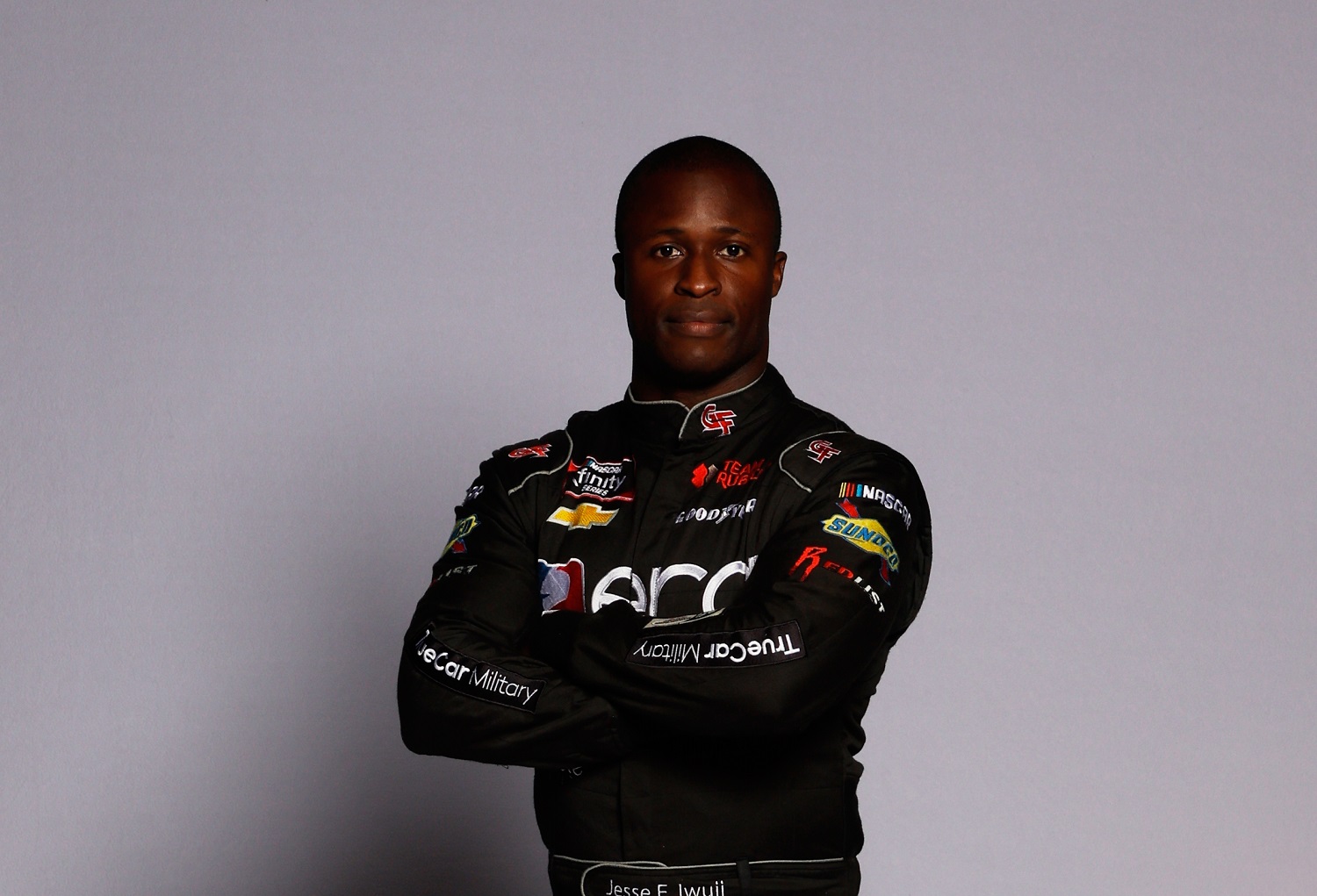NASCAR Xfinity driver Jesse Iwuji poses for a photo during NASCAR Production Days at Clutch Studios on Jan. 18, 2022, in Concord, North Carolina.