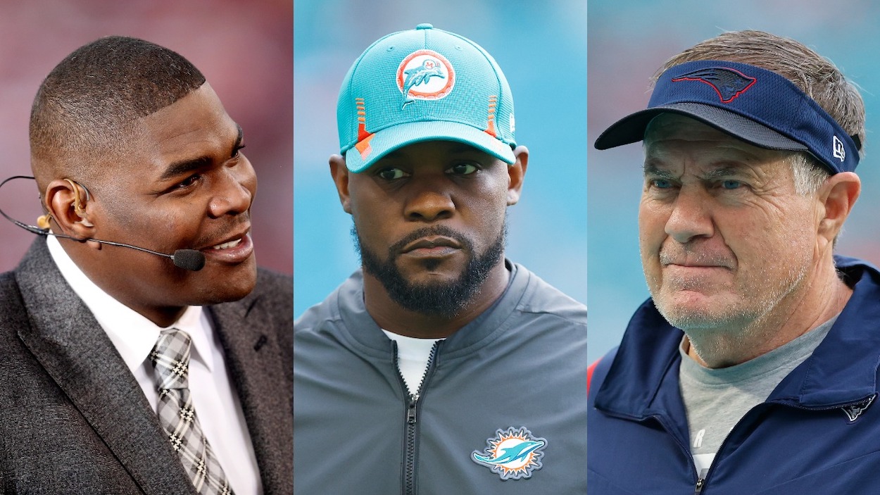 (L-R) former NFL WR and current ESPN analyst Keyshawn Johnson, former Miami Dolphins head coach Brian Flores, and New England Patriots head coach Bill Belichick. Johnson recently defended Belichick for his role in the Brian Flores lawsuit.