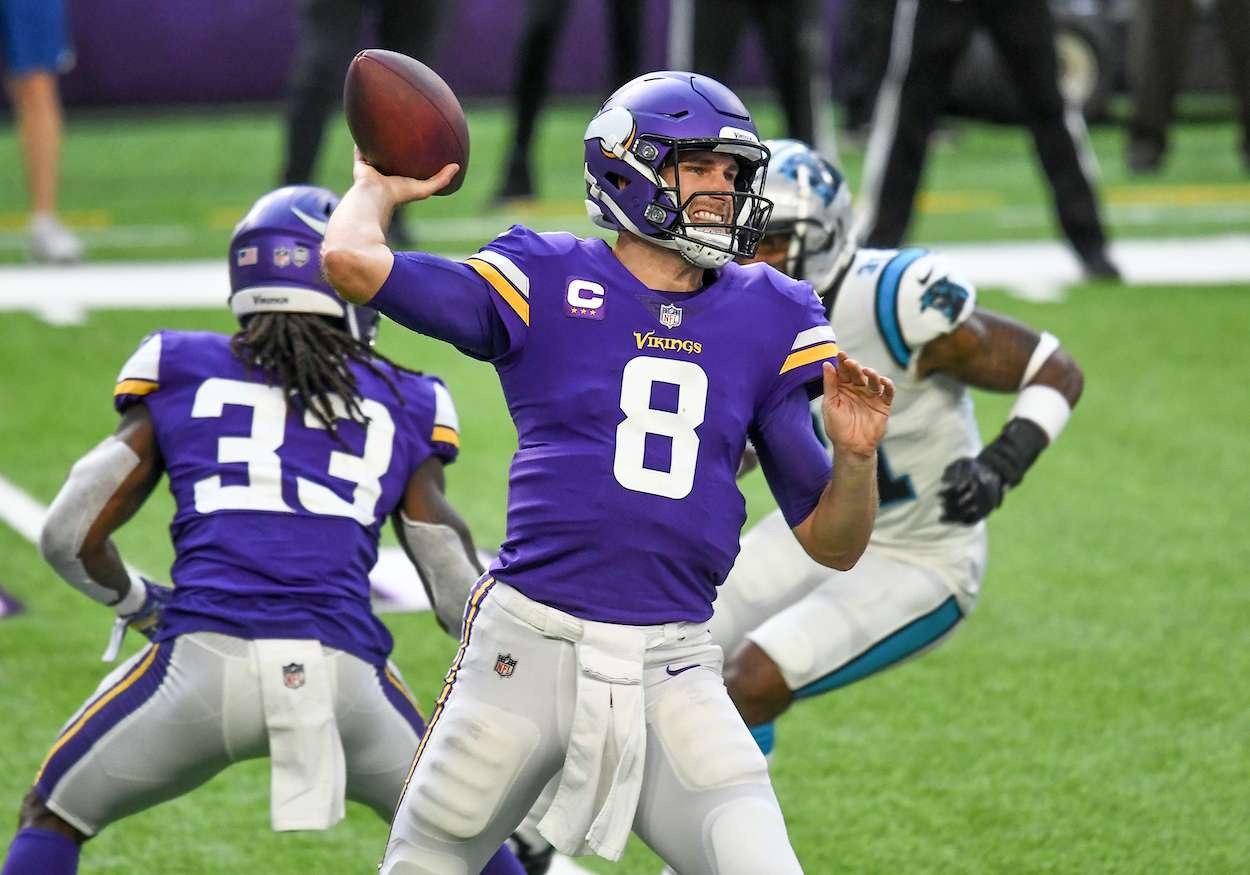 Minnesota Vikings Quarterback Kirk Cousins throws a pass during the 2nd quarter of a National Football League game between the Minnesota Vikings and Carolina Panthers on November 29, 2020, at US Bank Stadium, Minneapolis, MN. The latest Kirk Cousins rumors have the Panthers interested in the QB.