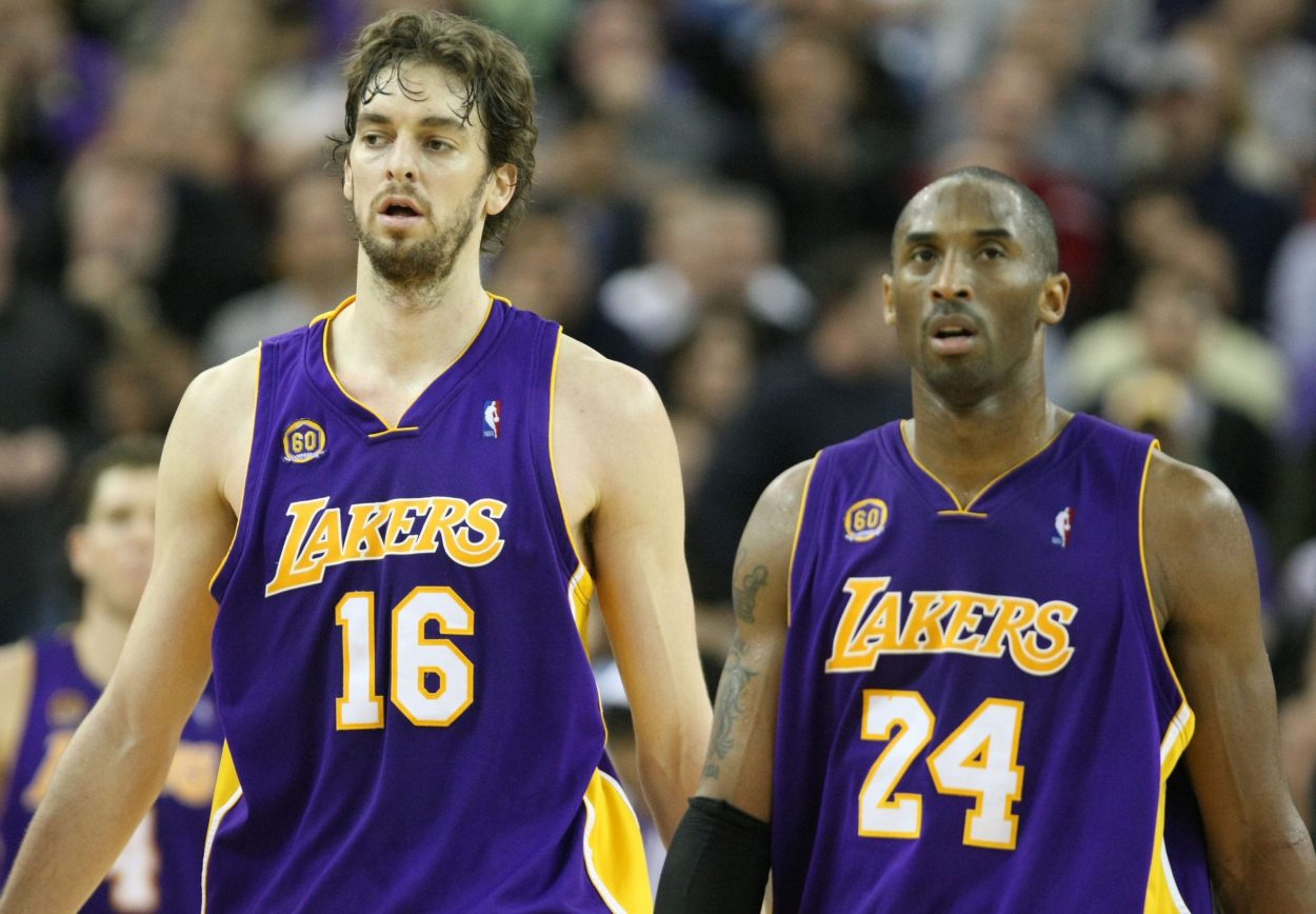 Former Los Angeles Lakers teammates Kobe Bryant (R) and Pau Gasol on the court during an NBA game in March 2008