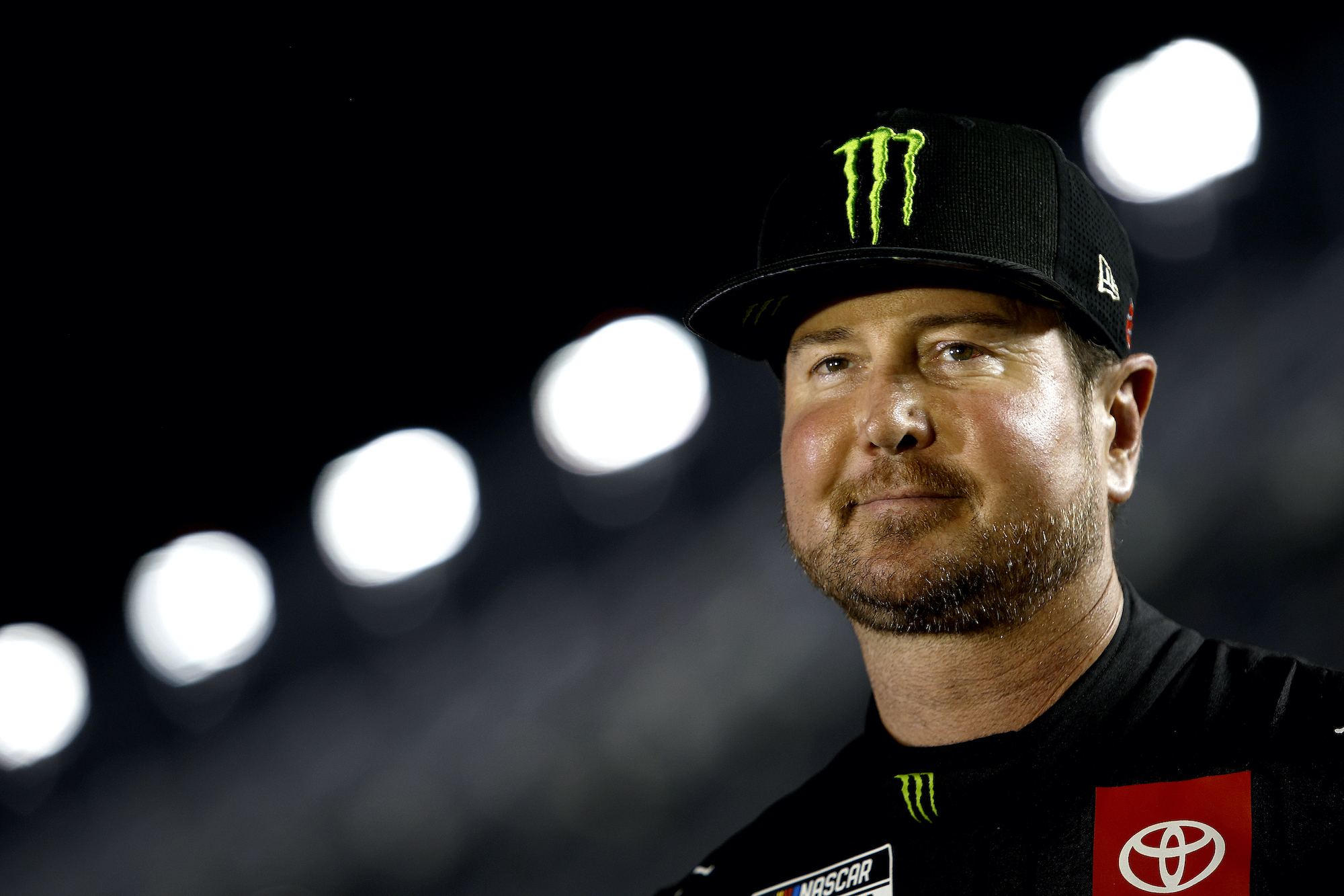 Kurt Busch stands on grid during qualifying