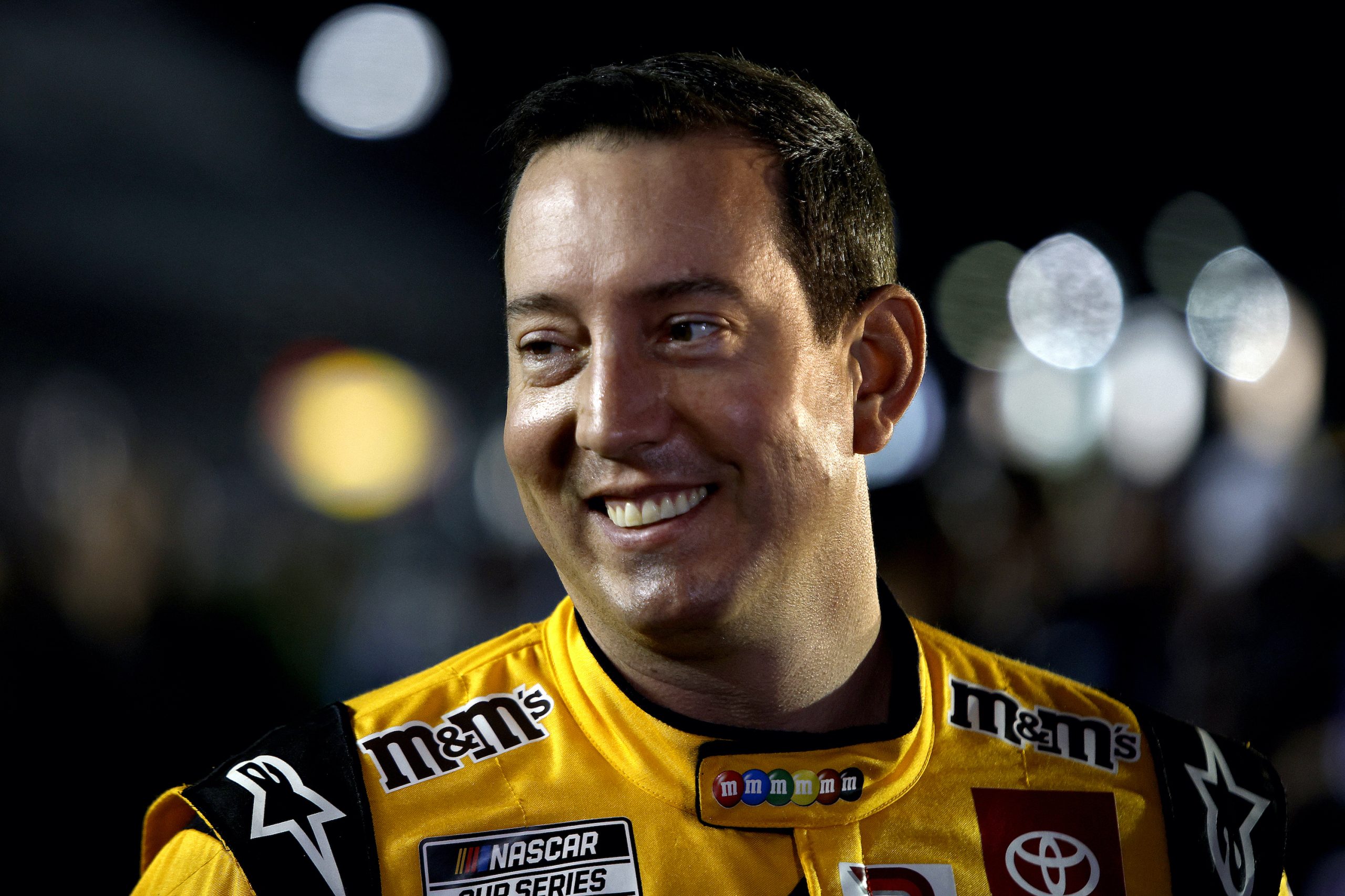 Kyle Busch looks on before qualifying