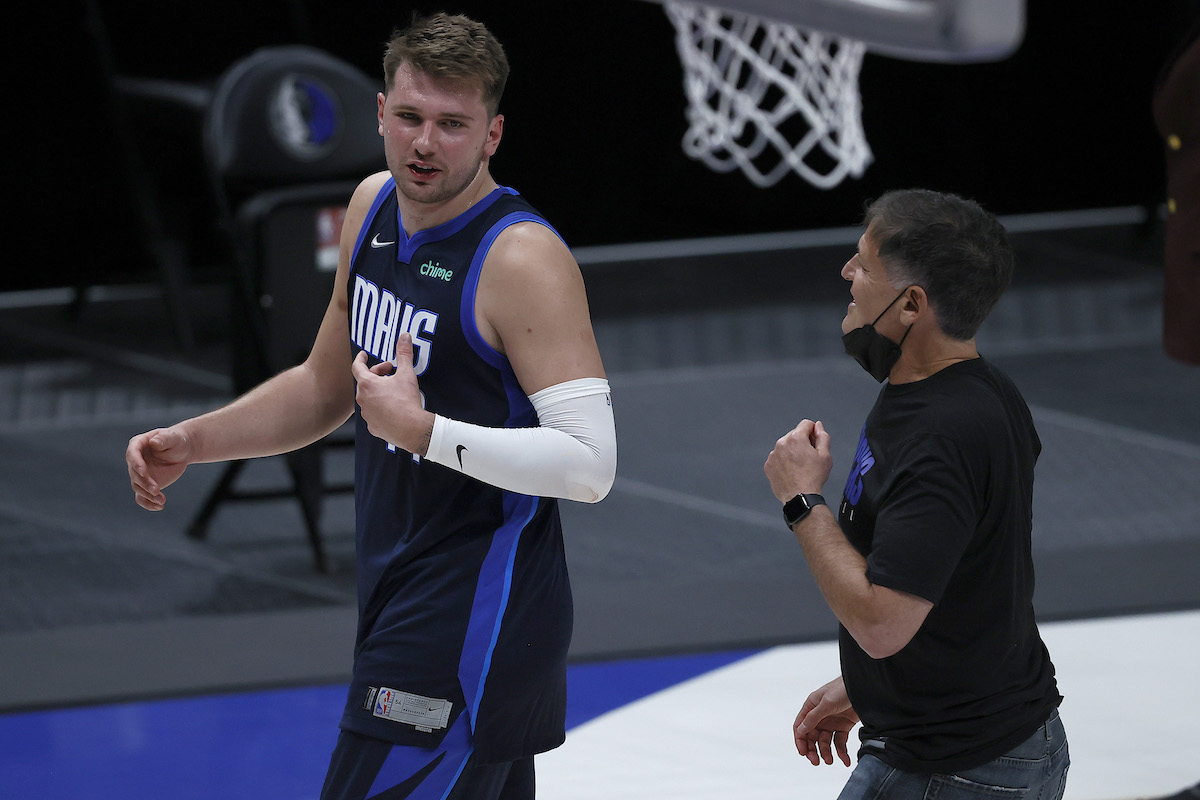 Luka Doncic and Mark Cuban talking