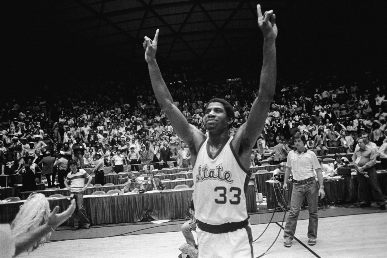 Point guard Magic Johnson celebrates Michigan State's triumph in the 1979 NCAA Championship Game