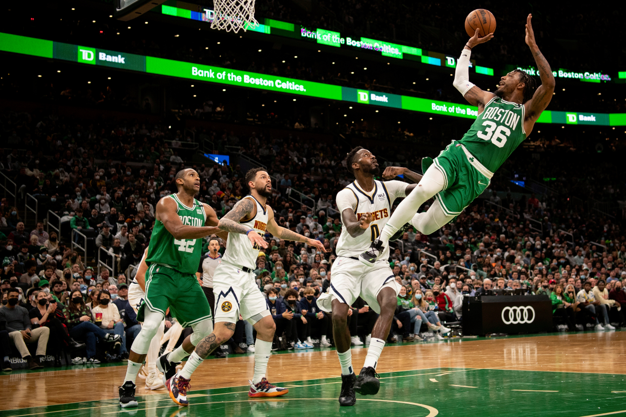 Marcus Smart of the Boston Celtics shoots the ball during the second half against the Denver Nuggets.