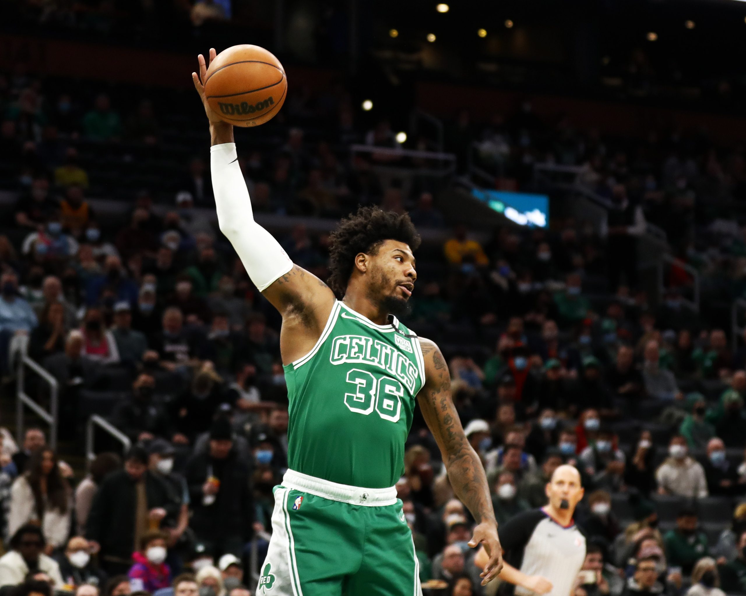 Marcus Smart of the Boston Celtics rebounds.