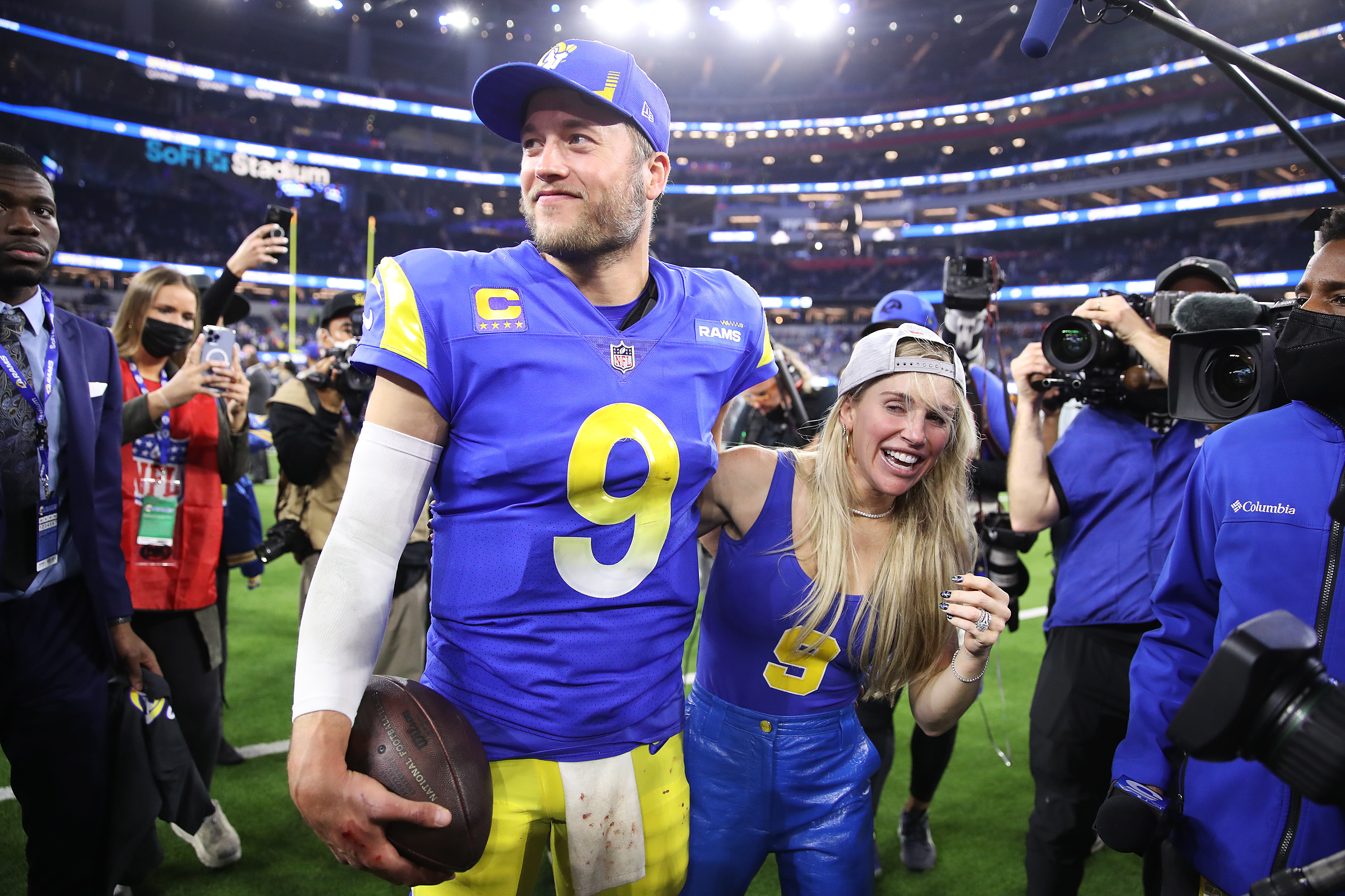 Matthew Stafford and Kelly Stafford celebrate the Rams winning the NFC Championship Game