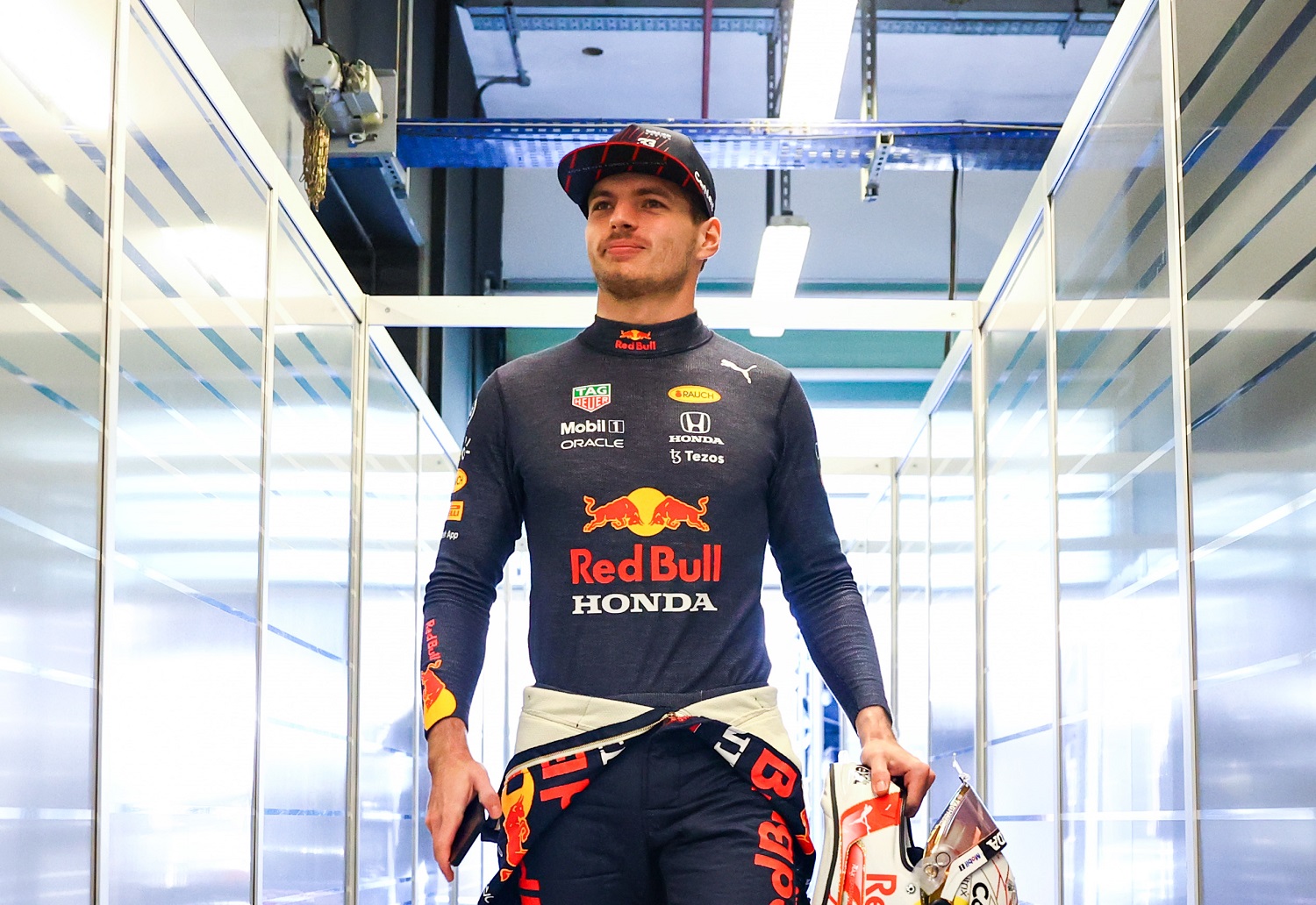 Max Verstappen of Red Bull Racing walks into the garage during Formula 1 testing at Yas Marina Circuit on Dec. 14, 2021, in Abu Dhabi, United Arab Emirates.