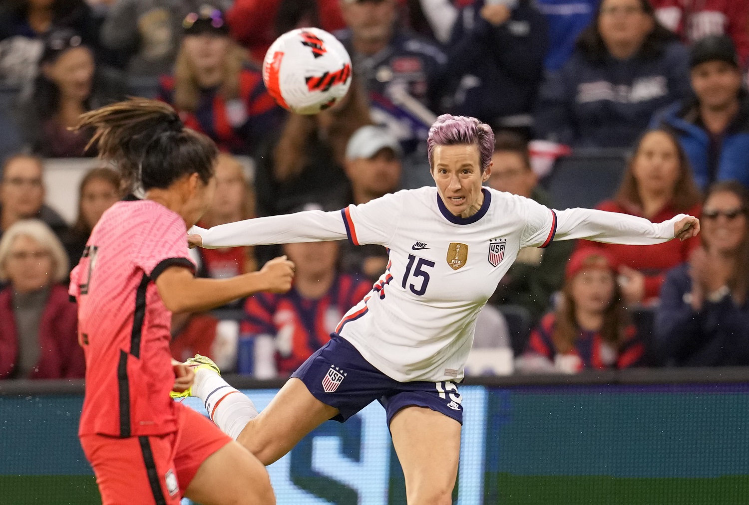 Megan Rapinoe heads a ball during a game against South Korea on Oct. 21, 2021, in Kansas City, Kansas. | Brad Smith/ISI Photos/Getty Images)