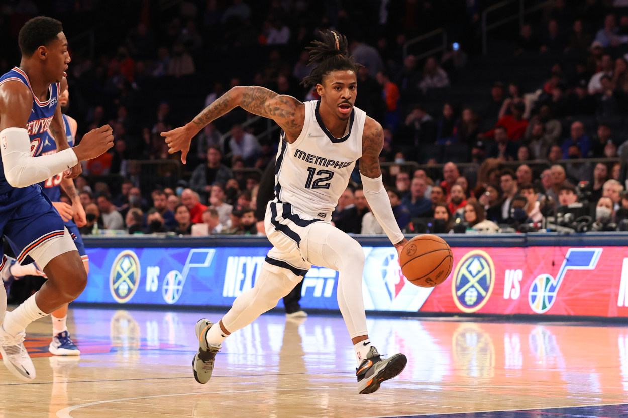 Memphis Grizzlies superstar guard Ja Morant drives to the basket against he New York Knicks on February 2, 2022 at Madison Square Garden in New York City.