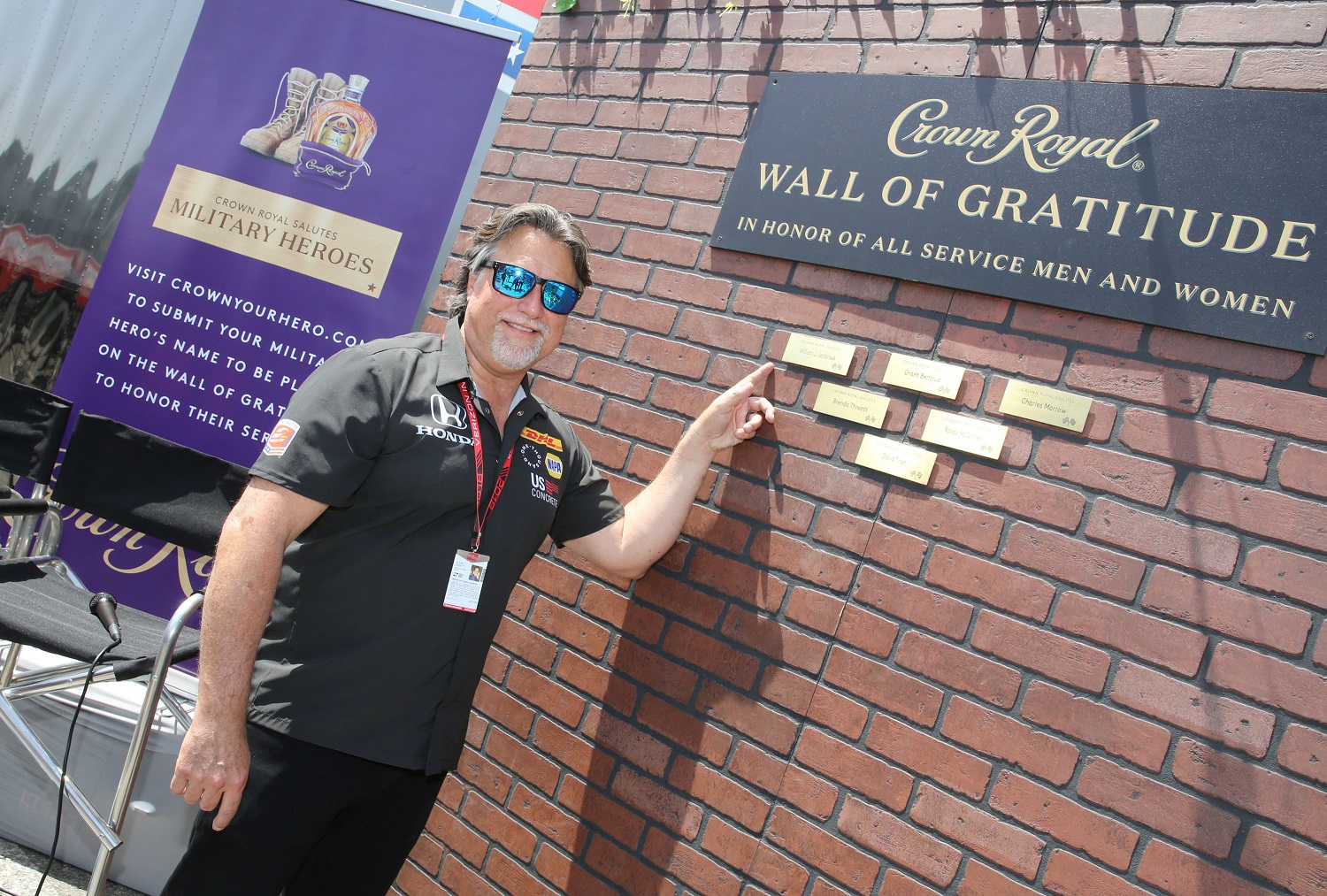 Andretti Autosport CEO and Chairman Michael Andretti pictured with the Wall of Gratitude during Crown Royal and Andretti Autosport team up to honor military heroes on April 13, 2018, in Long Beach, California.