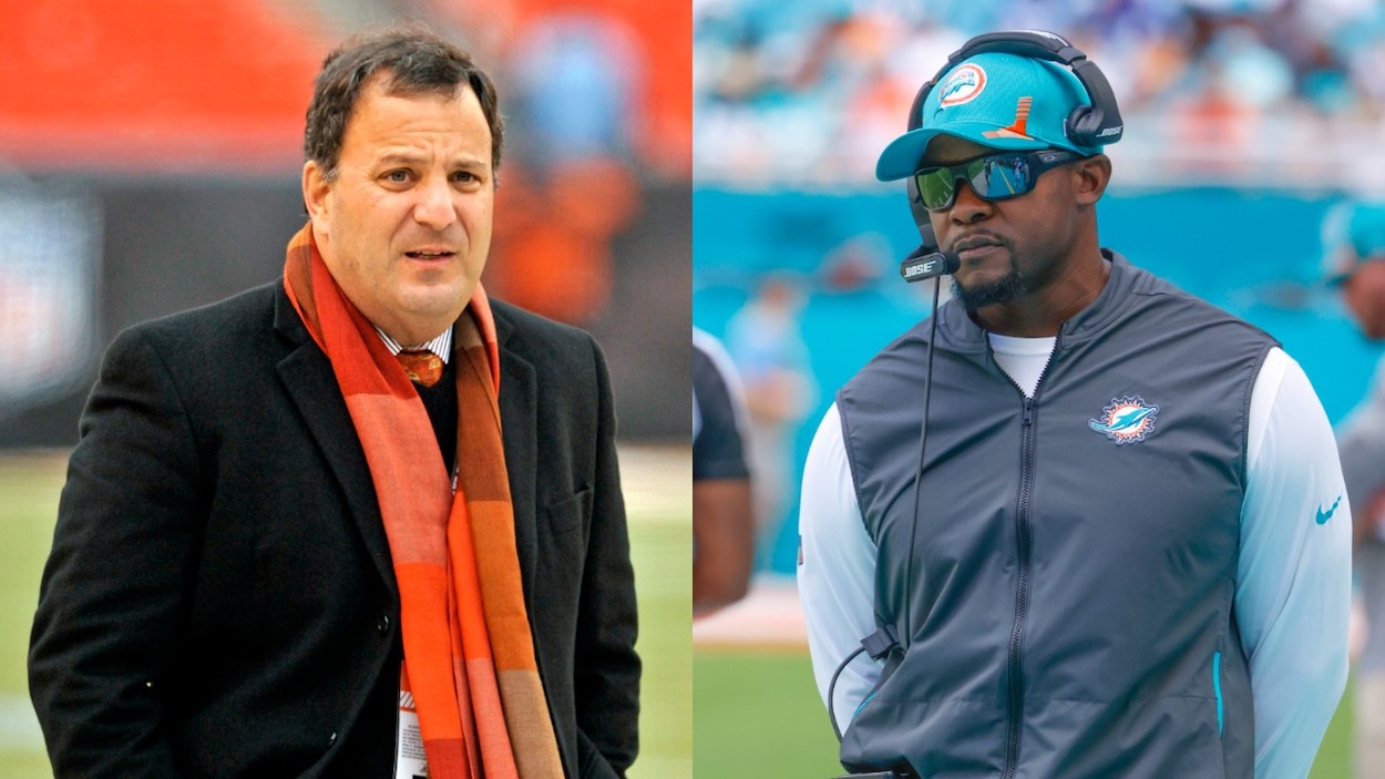(L-R) General manager Michael Lombardi of the Cleveland Browns on the field prior to a game against the Jacksonville Jaguars on December 1, 2013 at FirstEnergy Stadium in Cleveland, Ohio; Head coach Brian Flores of the Miami Dolphins looks on during second quarter action against the Indianapolis Colts during an NFL game on October 3, 2021 at Hard Rock Stadium in Miami Gardens, Florida.