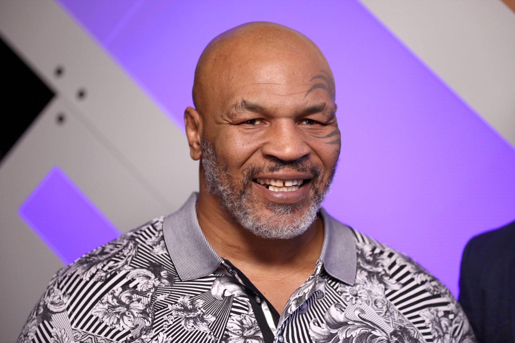 Mike Tyson net worth and image building at the Capital One Podcast Studio for the 2019 iHeartRadio Podcast Awards