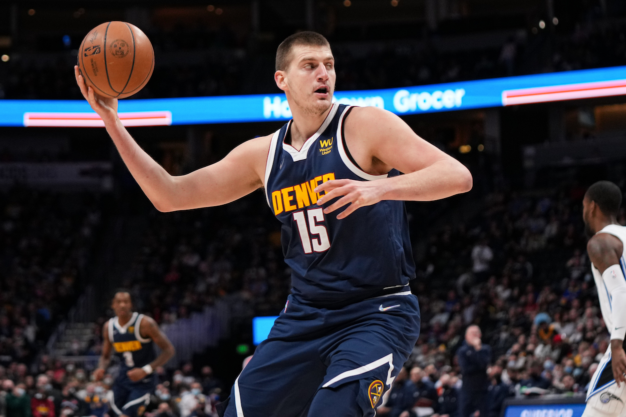 Nikola Jokic throwing a pass for Denver Nuggets