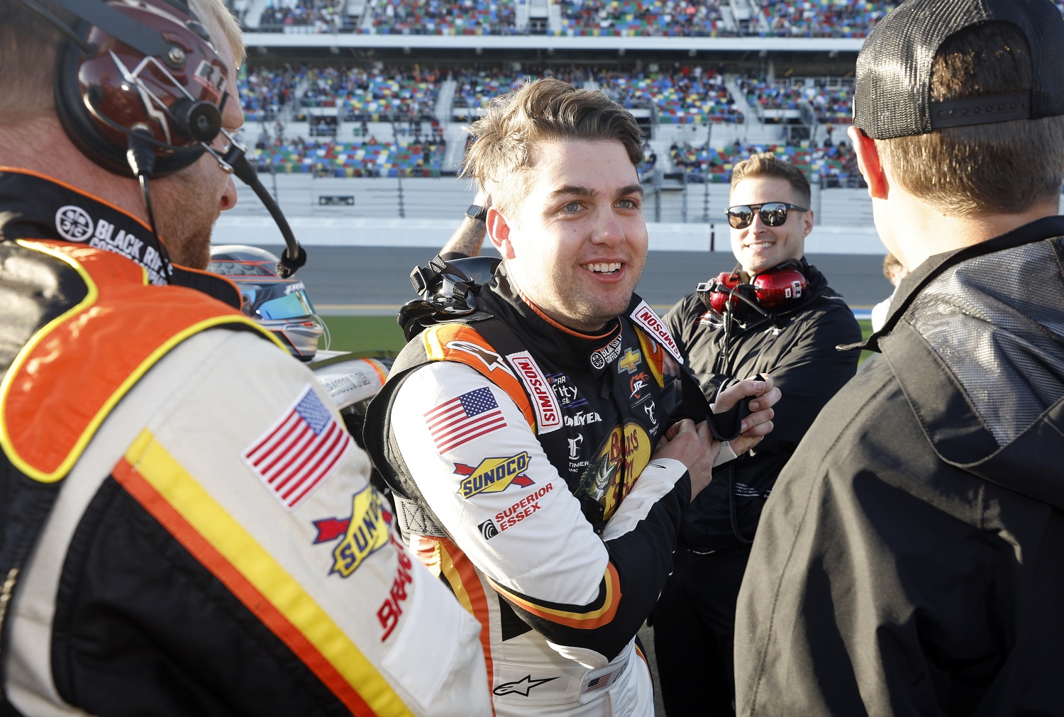 Noah Gragson talks with crew on the grid prior to the NASCAR Xfinity Series race at Daytona International Speedway on Feb. 19, 2022. | Chris Graythen/Getty Images