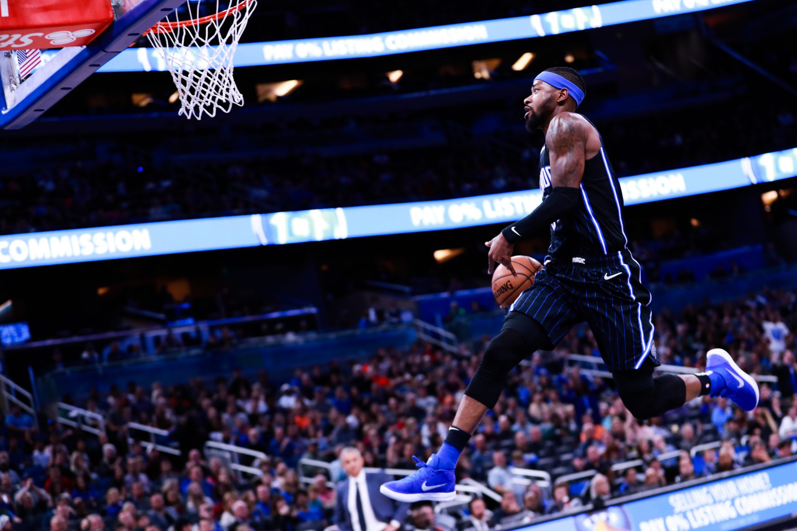 Orlando Magic stellar reserve guard Terrence Ross goes in for a windmill dunk against the Phoenix Suns in the fourth quarter at Amway Center on December 26, 2018 in Orlando, Florida.