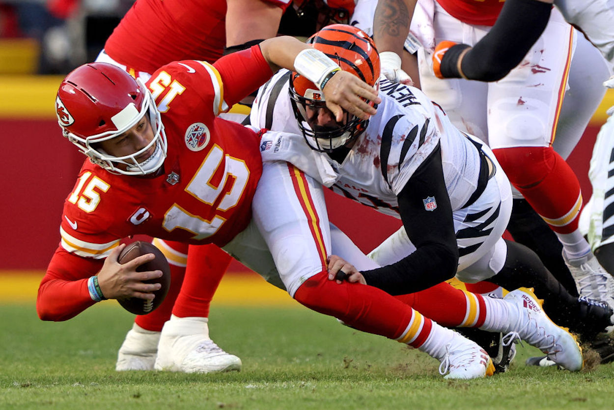 Chiefs quarterback Patrick Mahomes suffers a sack at the hands of Trey Hendrickson.