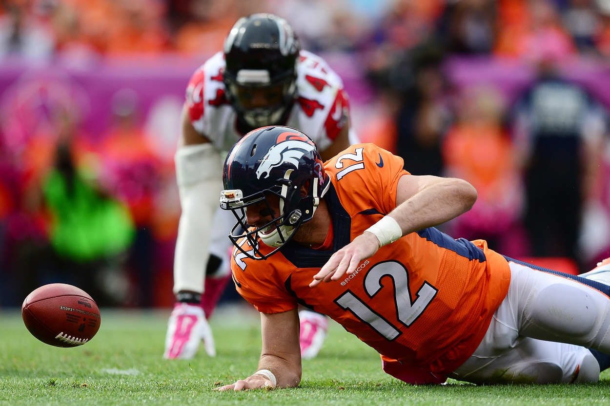 Paxton Lynch scrambles for the ball for the Denver Broncos in a matchup with the Atlanta Falcons in October 2016