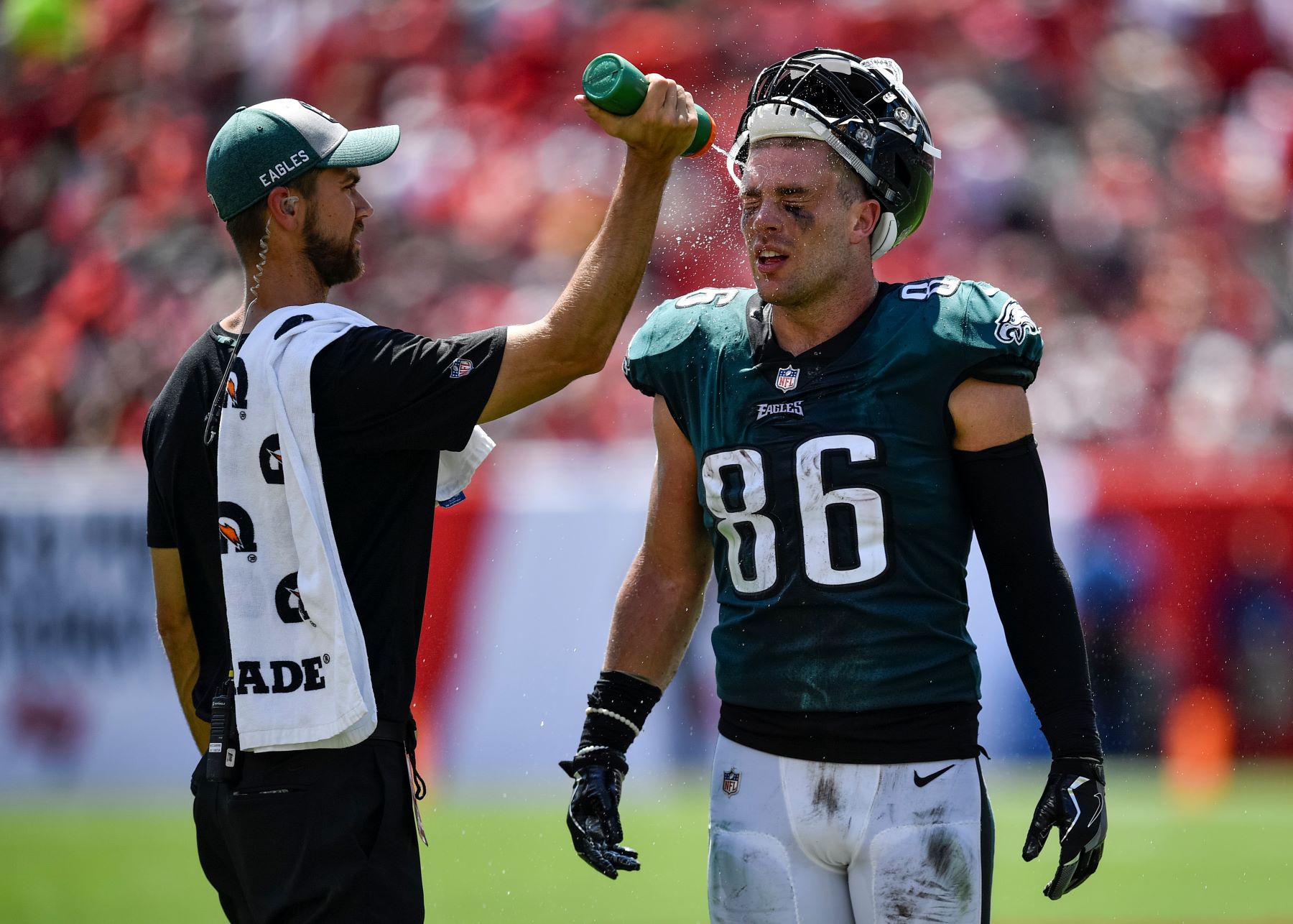 Philadelphia Eagles tight end Zach Ertz hosed down by water boy during an NFL game against the Tampy Bay Buccaneers at Raymond James Stadium in Tampa, Florida